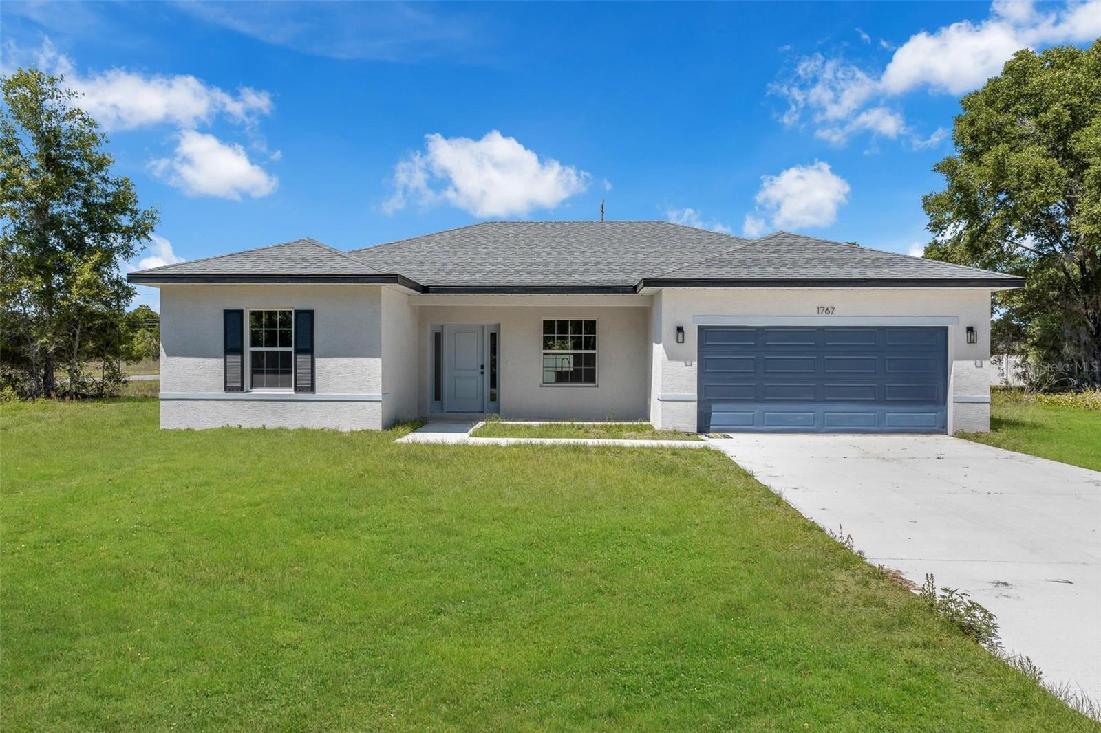Be the first to enjoy this beautiful brand-new construction home in Ocala! This stunning residence features 4 spacious bedrooms, 2 full bathrooms, and a thoughtfully designed open floor plan perfect for modern living. The bright and airy kitchen comes fully equipped with all stainless steel appliances, making meal preparation and entertaining a breeze. The primary suite offers a private retreat with ample space and comfort, while the additional bedrooms provide flexibility for family, guests, or a home office. A 2-car garage provides plenty of room for parking and storage. Conveniently located near shopping, dining, schools, and major roadways, this move-in-ready home combines style, comfort, and convenience. Schedule your showing today and make this brand-new Ocala home yours!