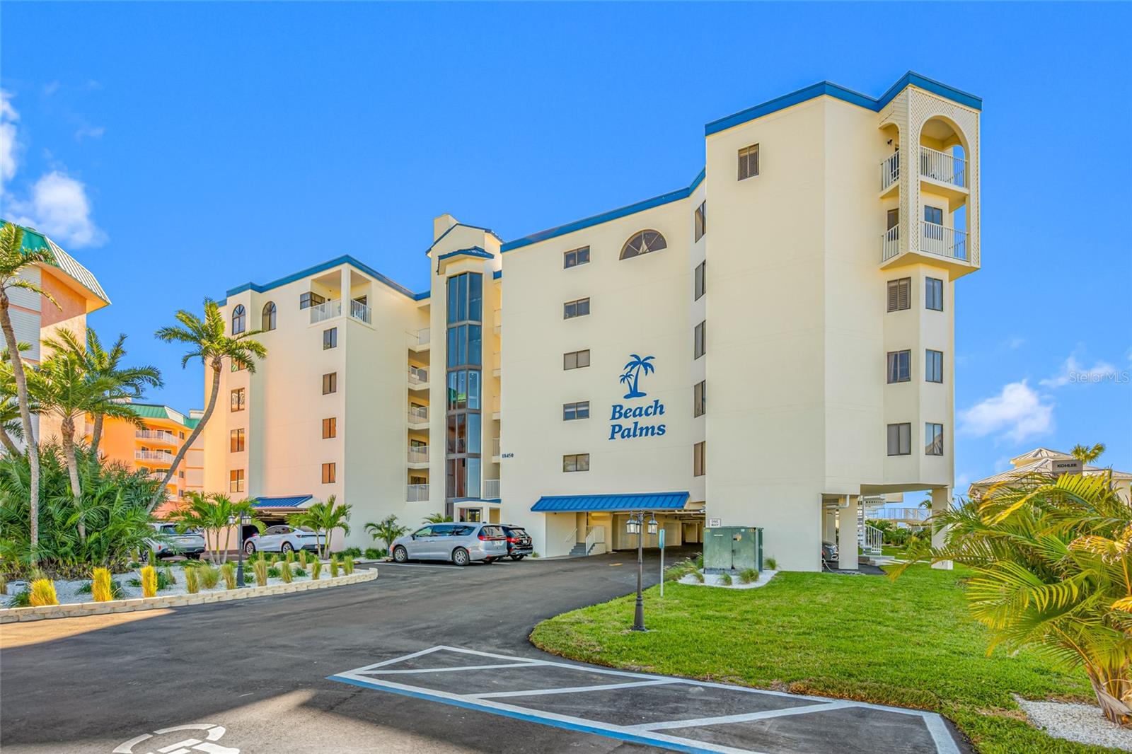 A prime oceanfront location and one-week minimum rental policy combine to make this beach property an incredible opportunity for investors and snowbirds alike. Situated on a pristine stretch of beach in Indian Shores, this 2BR 2BA corner unit features a well-designed open floorplan with split bedrooms, spacious dining area, and open kitchen with stainless-steel appliances including a new Frigidaire refrigerator, and granite countertop. Both baths are also updated with granite countertops, and the primary bedroom offers an en suite bathroom with dual sinks and a large closet. Situated directly on the Gulf, Beach Palms Condo is a tranquil community that is private yet close to everything including great restaurants, shops. entertainment, and endless water activities. Amenities include a resort-style heated pool that overlooks the Gulf, grilling area, outdoor showers and bathrooms, and club room for social events. This property also comes with a premium under building parking space conveniently located right next to the lobby entrance! Units can be rented weekly, monthly or annually. Enjoy the property when you wish and generate revenue when you are away. Call now to schedule your tour! Virtual tours are also available.