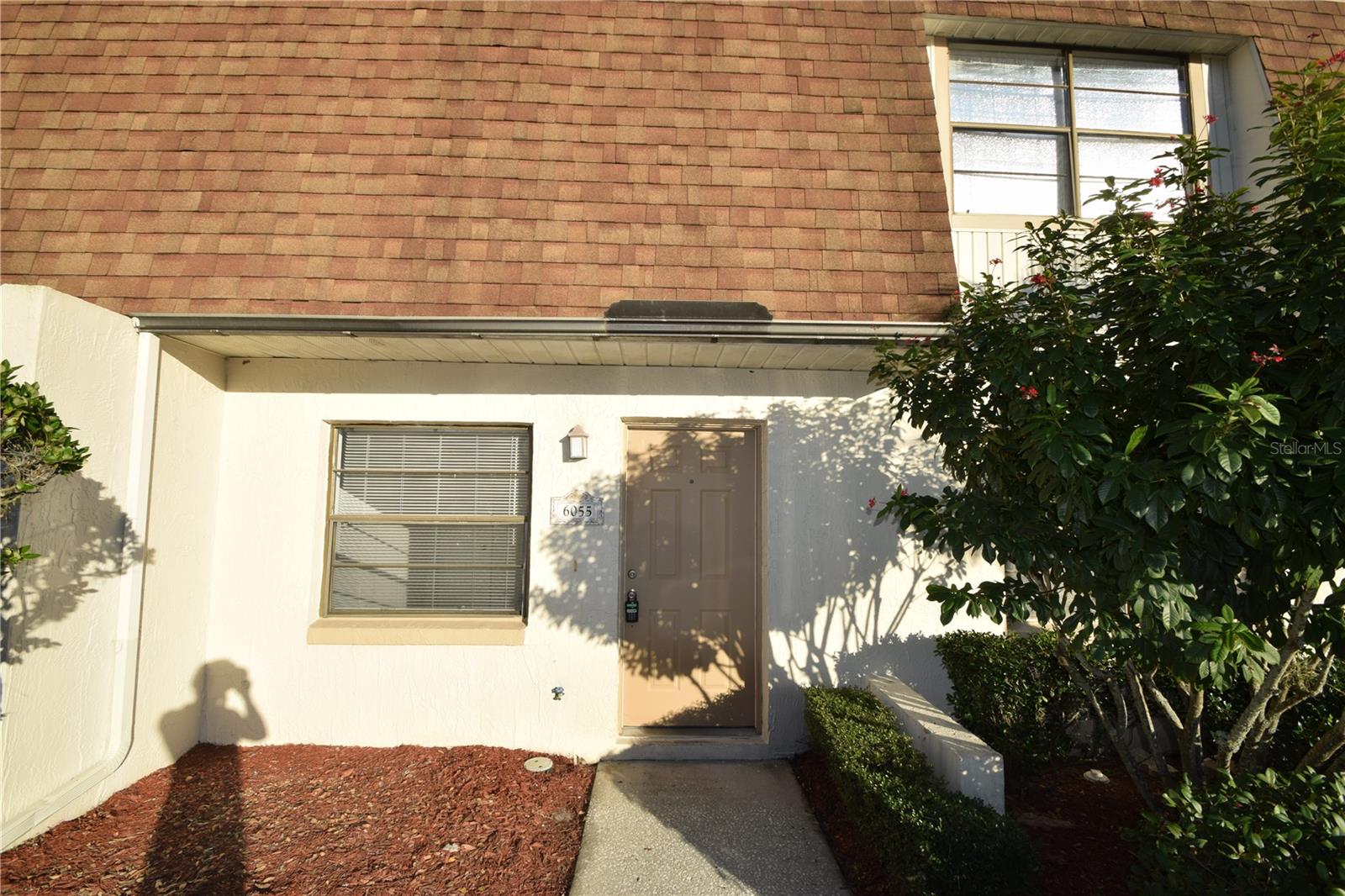 Two bedroom, 1-bath ground-floor condo is located in the highly desirable Imperial Lakes at Fairwoods community—conveniently situated near Shepherd Road and South Florida Avenue. Step inside to find low-maintenance ceramic tile flooring throughout the main living areas. Both bedrooms feature spacious walk-in closets, and the screened-in back porch offers a perfect spot to relax or entertain. A washer and dryer are included for everyday convenience. Residents enjoy access to a sparkling community pool, and the monthly HOA fee covers exterior maintenance, pest control, and trash service—making this an easy, low-maintenance lifestyle. Cash and conventional financing are accepted. Please note: the community is not approved for FHA financing.