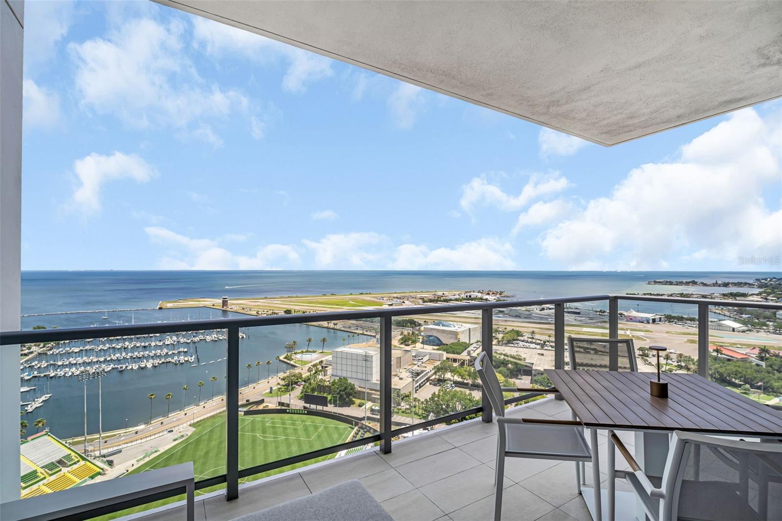 SALTAIRE’S BEST FLOOR PLAN DESGINED BY AN AWARD-WINNING DESIGN FIRM. This exceptional residence offers BIG living spaces, refined finishes, and sweeping views of Tampa Bay, The St Pier and marinas, and so much more. Spanning 2,712 interior square feet with an oversized private terrace, this 3-bedroom plus den, 4-bathroom plus den condo combines the comfort of a luxury home with the ease and beauty of premier condominium living.

 

The WOW factor starts when you open the door. The purpose-built foyer allows you to drop off your keys and kick off your shoes in luxury as you make your way to the expansive great room. The open kitchen flows seamlessly into the dining and living rooms, all surrounded by dramatic floor-to-ceiling glass, creating a welcoming atmosphere for both everyday living and hosting guests. Panoramic sunrise, waterfront and city views can be captured from nearly every room. The terrace extends the living space outdoors, creating the perfect setting for morning coffee, evening cocktails, or entertaining against a stunning waterfront backdrop.

 

Curated and thoughtfully designed throughout by the renowned Palm Beach-based firm Decorators Unlimited, this residence blends sophisticated style with modern smart-home technology. Lutron lighting, programmable scenes, and smart thermostats provide effortless comfort and convenience that could be controlled by your phone.

 

Custom cabinetry, designer built-ins, and refined millwork add warmth and character throughout the den, living room, and owner’s suite. Integrated accent lighting enhances the home’s elevated design. Technology is seamlessly integrated throughout the home, including a built-in Sonos sound system with surround sound in the den and additional speakers in the kitchen and owner’s bath. Wireless access points throughout the residence and terrace provide strong connectivity indoors and out. Additional upgrades include automated blinds, heat-reflective window film installed in 2024, and a complete interior repaint in 2025 using premium finishes.

 

The owner’s suite offers a complete disconnect from the outside world. A place where you can kick back, read a book, soak up the water views, relax and experience a refreshing sleep. The designer wall coverings, motion-sensor lighting, and a spa-inspired bath and two custom walk-in closets provide elevated comfort and style.

 

Occupying the west wing of the residence, the den, guest suites and over-sized laundry room create an ideal retreat for visitors, extended stays, or a private work-from-home setting. Guest bedroom #1 also features a custom 2025 Murphy Bed, allowing the space to function as a guest retreat, media lounge, or executive office.

 

Residents of Saltaire enjoy resort-style amenities including a waterfront pool deck, fitness center, concierge services, social rooms, dog park, and walkable access to the St. Pete Pier, marinas, fine dining, Albert Whitted Airport, Mahaffey Theater, museums, Rowdies Soccer Stadium, galleries, grocery stores... There is so much to see; you have to come and experience it for yourself.