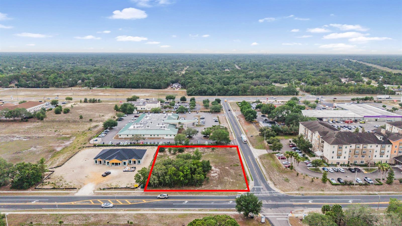 Unlock the potential of this PDP(GHC) commercial parcel in one of Spring Hill’s most active growth corridors. Strategically positioned directly across from Tampa General Hospital SpringHill and Hernando County’s public elementary school, this site offers unmatched visibility and daily traffic. The property sits in close proximity to two Publix shopping centers and is just one block from Starbucks, placing your future development in the center of established consumer activity.
Perfectly suited for professional offices, medical, retail, hospitality, or mixed commercial development, this parcel benefits from strong surrounding infrastructure and continuous area expansion. With rapid residential growth and high-demand commercial activity nearby, this location delivers exceptional long-term value for developers and end-users.
Build and grow your business in one of Spring Hill’s most sought-after commercial zones.