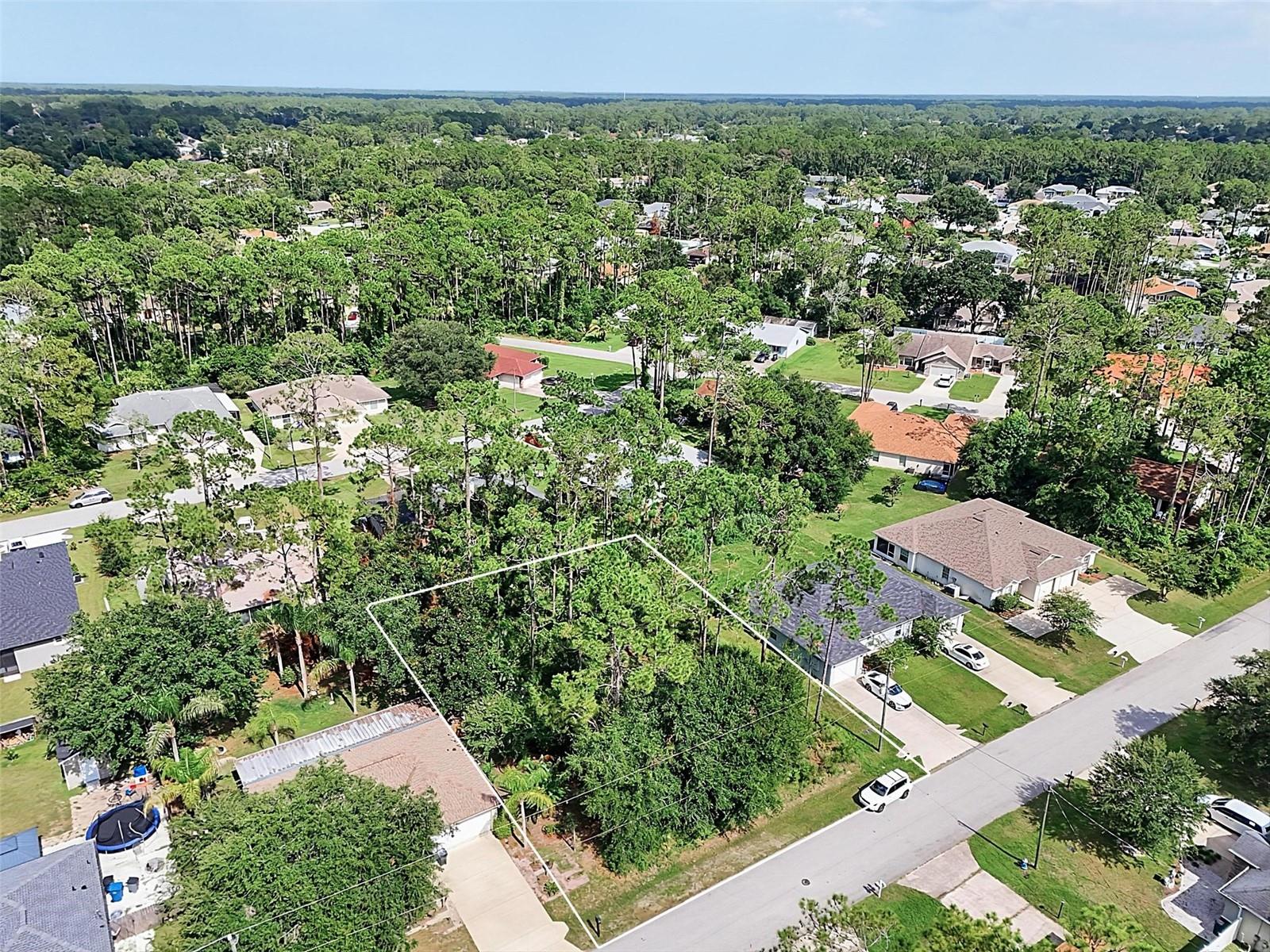 The beach is certainly within reach on this new lot listing!  Build your dream home in on of Palm Coast's most desirable and established neighborhoods!  This beautiful homesite is nestled in the sought-after Pine Lakes Community, offering the perfect blend of privacy, mature landscaping, and convenience.  Located in the heart of Palm Coast, you'll enjoy quick access to shopping, dining, medical facilities, parks, golf, top-rated schools, and just a short drive to the area's beautiful beaches.  Pine Lakes is known for its spacious homesites, established surroundings, and welcoming atmosphere, making it an ideal location for families, or anyone looking to otherwise enjoy the Florida lifestyle.  Whether you are a builder searching for your next project or a buyer ready to design your custom dream home, this lot offers endless possibilities.  Don't miss this opportunity to own a prime piece of land in one of Palm Coast's premier communities.