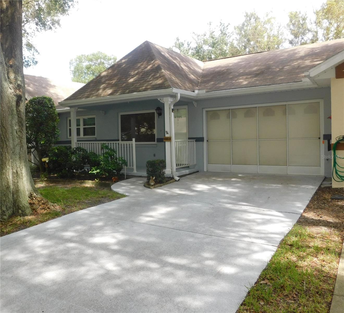 Great Opportunity to Purchase this recently painted, Layfette Villa! This 2/2/1 Villa offers a combination of Living Rm and Dining Area with Laminate Floors. This is perfect to entertain your family and friends. The kitchen has a new Refrigerator, Range, Microwave, Dishwasher, Pantry, and Eat-in Area. The Kitchen leads to the glass-enclosed Lanai under Heat/ AC. The Guest Bedroom and Bathroom are perfect for your guests’ overnight stays. The Master Bedroom has a W/I Closet. The Master Bathroom has a Walk-in Shower and Vanity. Both bedrooms have laminate floors. The new washer, dryer, and utility sink are in the garage. Recently painted Front Porch floor. The front porch overlooks a tree-lined street, a great area to meet your new neighbors. The roof is to be Replaced in 2023, the seller will place the roof assessment in escrow at closing. Interior painted in 2023, New Garage Door Springs, Driveway recoated, New Windows 2021, Storm Door 2021. Enjoy the Lifestyle in Ocala's Premier, Gated, 55 Plus Community. Numerous Amenities, Pools, Clubhouses, and Golf, with Golf Cart access to Shopping Centers, Medical and Dental Offices, and Restaurants.