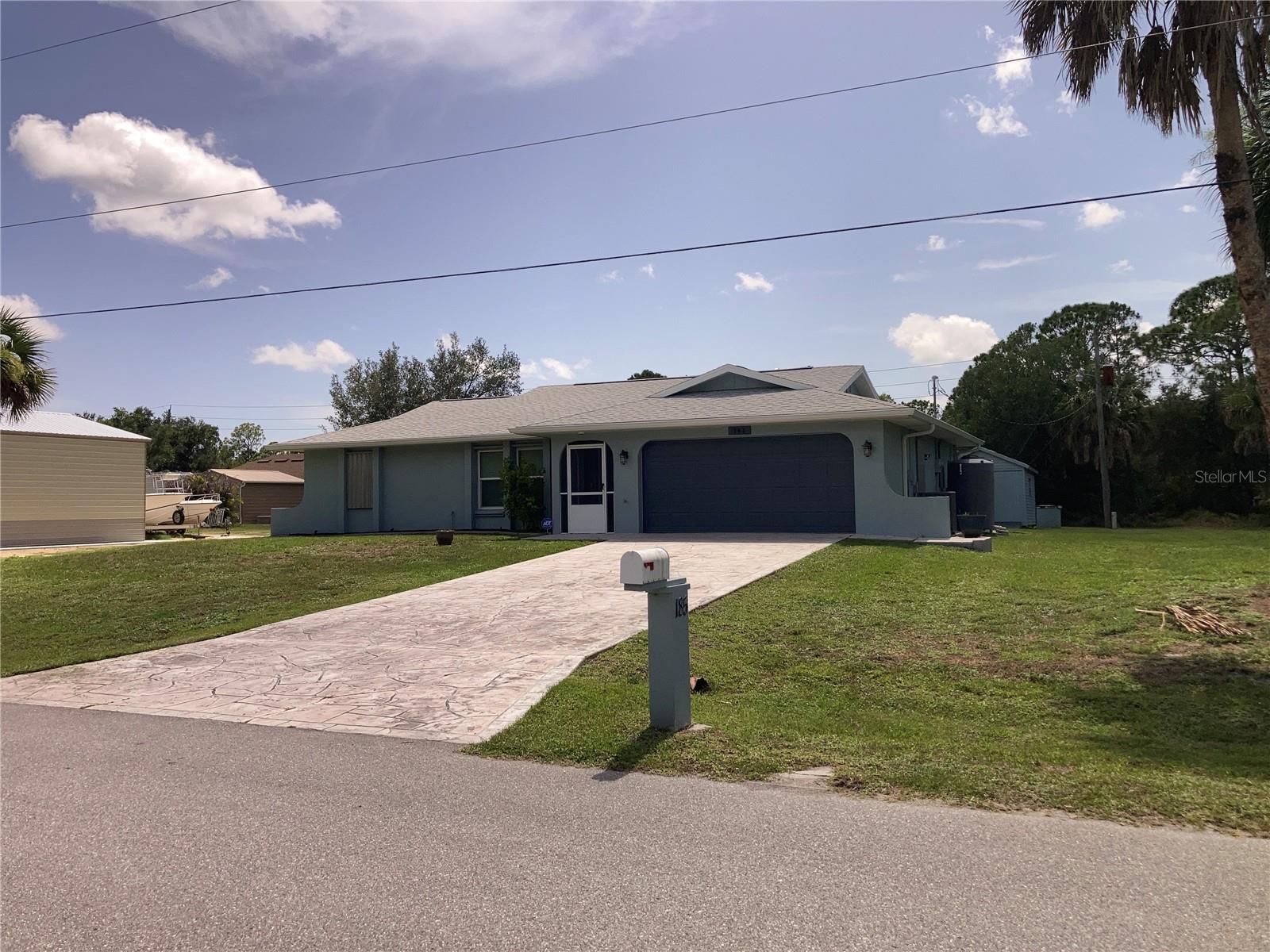 This is the Florida lifestyle! This well- maintained 3/2/2 pool home is ready to move in and enjoy putting in your personal touches. The sun rises in the mornings out front windows, and sets over the lanai and the pool  in the evenings. There is a storage shed out back for all your extra equipment and belongings. The North Port Shopping strip is a very short drive or bike ride and has churches, restaurants, and shopping close by. There is a complete RO Water Filtration System for the whole house. The roof and pool cage were new in 2023.