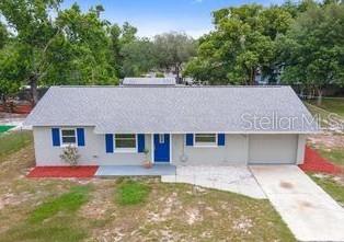 Fall in love with this adorable and affordable home, beautifully remodeled and move-in ready... ROOF REPLACED 2022!! Featuring luxury vinyl wood-look flooring throughout, a stylish kitchen with granite countertops, stainless steel appliances, and abundant cabinet space to include a closet pantry...this home offers comfort and convenience at every turn. Enjoy three spacious bedrooms, two bathrooms, an oversized one-car garage with dedicated laundry area, and a durable Maytag washer and dryer that convey. Relax or entertain on the huge 27’ x 11’ screened wood deck and take advantage of the detached 19’ x 15’ workshop with electric—perfect for a man cave, "she shed", hobby space, or extra storage. With newer double-pane windows and a brand-new water heater installed in June 2026, the major updates are already done for you. Enjoy the benefit of the WELL and NO WATER BILL! Water Softener/ Filtration replaced 2025! Trane 2.5 Ton air Handler March 2019. Don’t miss this opportunity—schedule your private showing today and make this charming home yours before it’s gone!