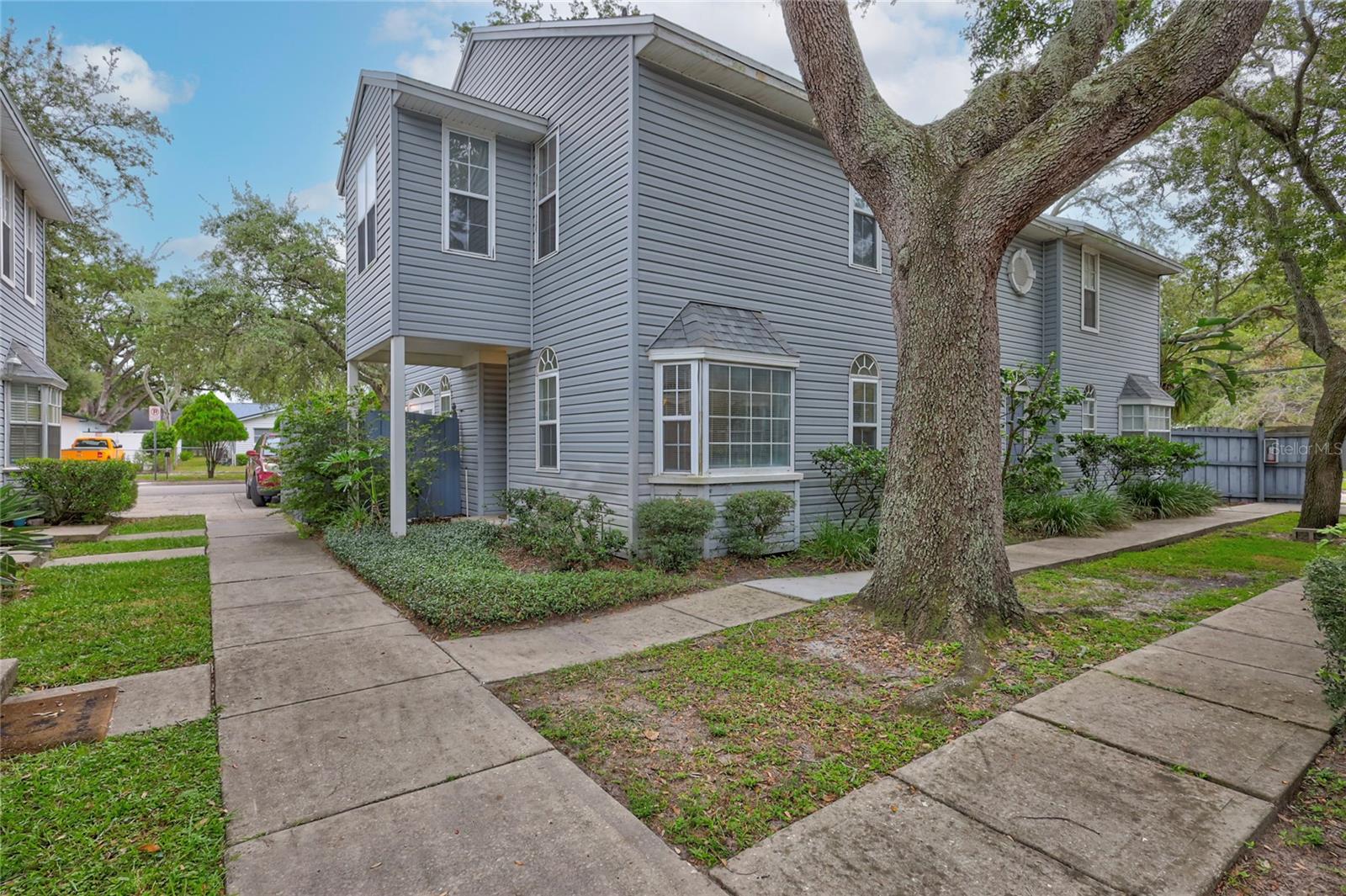 Proud to present this beautifully renovated 2bed/2bath, 1097 sqft (1,228 total sqft), built 1986 townhouse that is bright, spacious and located in desirable South Tampa that provides easy access to Gandy Bridge, Crosstown Expwy, MacDill AFB, shopping, dining, schools, hospitals, etc. NEW ROOF AND AC. Large kitchen features dining space, breakfast bar, pantry, granite countertops, white shaker cabinets, subway backsplash, tile floors and newer stainless stainless-steel appliance package including range, fridge, dishwasher and microwave. Tall ceilings in living room with tile floors, ceiling fans, storage under the stairs and slider leading out to private patio. Both bedrooms and tastefully updated bathrooms are on 2nd floor along with walk-in master closet and loft that's perfect for home office or play/homework area. Other features include dedicated parking space, washer/dryer hookup and situated in X flood zone so no need for flood insurance. This gem will not last long so hurry! Seller will respond to all offers same day! Call, view, make offer and get a response today!