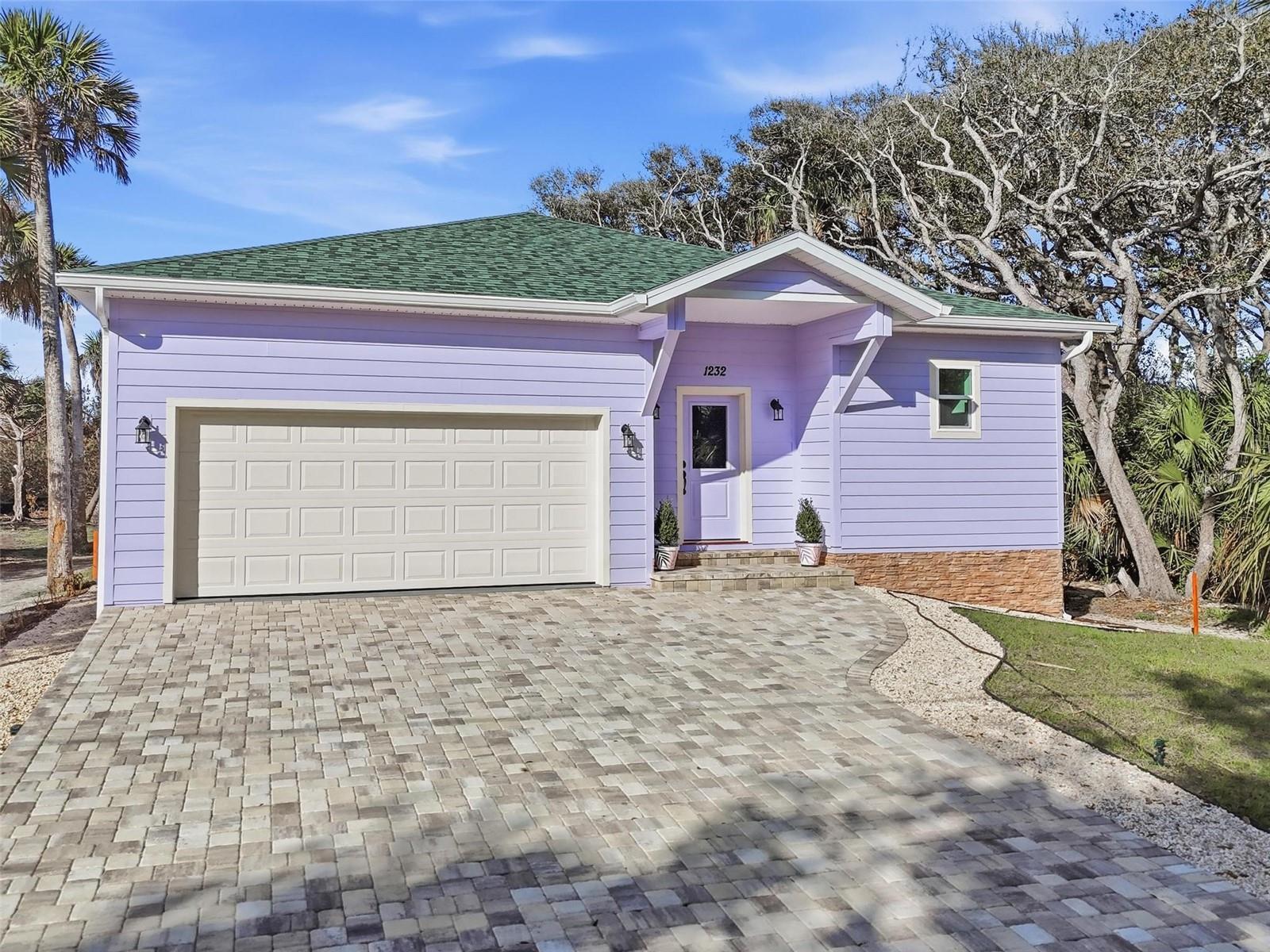 BRAND NEW CUSTOM BUILT 4 bedrooms, 2.5 baths home, just 400 yards to the beach, within steps to Wickline park and the library, and a boardwalk to the intra-costal waterway. RAISED 5 FEET WITH STEMWALL CONSTRUCTION to virtually eliminate any risk of flooding. The floors are covered with luxury vinyl in all main areas and tile in the bathrooms. The kitchen offers plenty of work surfaces with quartz countertops and ample storage in the upgraded cabinets, stainless appliances complete this beautiful and functional kitchen. The kitchen flows into the living room where you'll find the family gathering and dining areas. There is also a separate flex room that can be used as home office, flex room, additional bedroom, play room, in-law or formal dining/living room. In the large guest bath you'll find a shower, soaking bath tub and SAUNA. At the back you'll find a private deck where you can enjoy unspoiled views and amazing sunsets. This home is ready to move in with washer/dryer and furnishing that is available for purchase - even the TV is included. Two car garage with multiple outlets and a workbench/storage shelf is there to keep your cars from the elements. The house is located in the beautiful, quaint beach town of Flagler Beach where you can enjoy driving your golf cart to great restaurants, go fishing or just enjoy the sun on the beach.