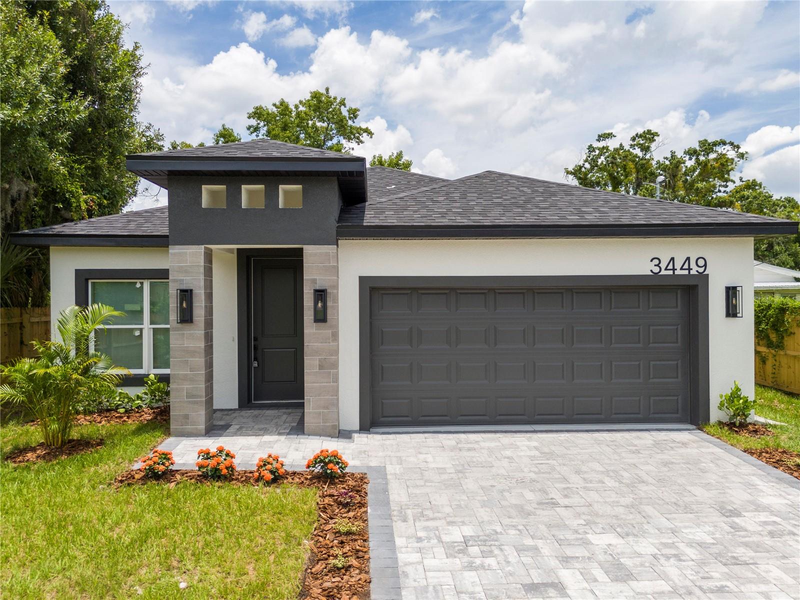 Virtually Staged. NEW CONSTRUCTION in the heart of Orlando! This beautifully designed 4-bedroom, 2.5-bath home offers modern living with an open-concept floor plan and an attached 2-car garage, all situated on an oversized 7,700-square-foot homesite.

The thoughtfully designed layout features a spacious family room that flows seamlessly into the kitchen and dining area, creating the perfect setting for everyday living and entertaining. The split-bedroom floor plan provides privacy, with the primary suite offering a walk-in closet and private en-suite bath.

Three additional bedrooms share a full bathroom, while a convenient half bath is available for guests. The home also includes an interior laundry room and a covered rear porch overlooking the spacious backyard, providing plenty of room for outdoor living, entertaining, pets, or future enhancements.

Built with modern finishes and energy-efficient construction, this brand-new home offers the peace of mind that comes with new systems, updated materials, and low-maintenance living.

Conveniently located near Downtown Orlando, major highways, shopping, dining, schools, and entertainment, this property offers easy access to everything Central Florida has to offer. Whether you are a first-time homebuyer, growing family, or investor, this is an outstanding opportunity to own a brand-new home in an established Orlando neighborhood.