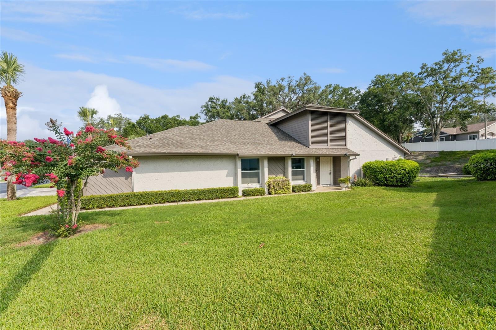 A hidden gem tucked away in an extremely well maintained community with brand new roofs, paver driveways, community pool, and tennis/pickleball courts. This 2 bedroom, 2 bath condo features a wood burning fireplace in the living area , private screened in porch off the dining room,  an inside laundry closet, and an attached single car garage. Conveniently located to shopping, restaurants, post office, and close to I-4. This has it all! Pack your bags and move in ASAP.  Call today before it goes away!!!!