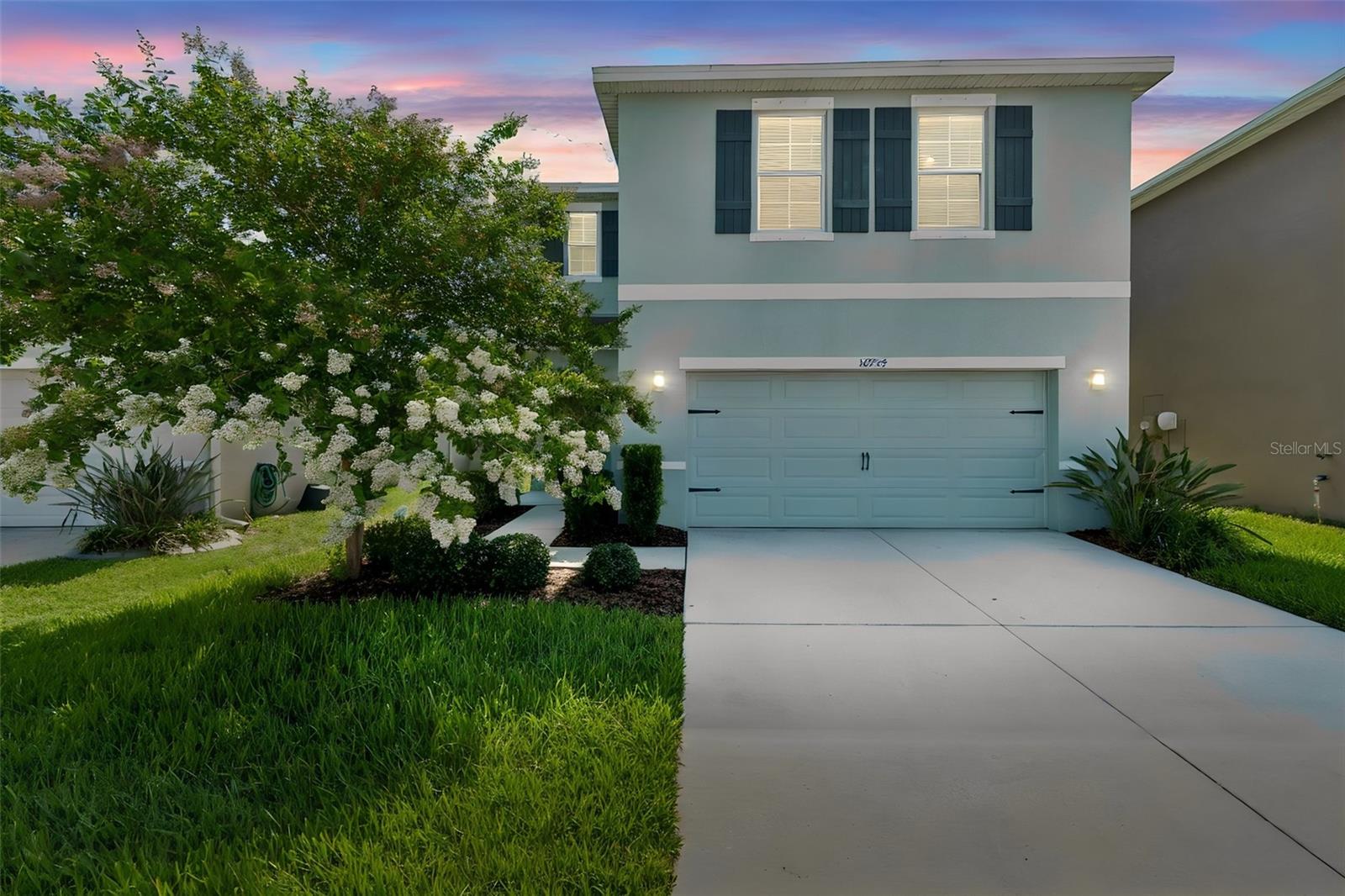 Virtually Staged. Welcome to RESORT-STYLE living in the GUARD-GATED LAGOON COMMUNITY of Southshore Bay! This beautifully maintained 2020-built, two-story home offers 4 bedrooms and 2.5 baths with SERENE POND VIEWS from the FULLY FENCED backyard. Step inside to a bright, open foyer with tile flooring that carries into the kitchen. The heart of the home is an impressive OPEN-CONCEPT kitchen featuring white shaker cabinets, dark GRANITE COUNTERTOPS, a large center island with an undermount sink and bar seating, Samsung STAINLESS STEEL APPLIANCES, stylish tile backsplash, and recessed lighting, all overlooking the spacious living and dining areas. LUXURY VINYL PLANK flooring flows through the remainder of the main level and continues upstairs through all four bedrooms, giving the entire home a clean, cohesive look with the added bonus of easy, LOW-MAINTENANCE living. No carpet anywhere. A convenient half bath completes the first floor. The PRIMARY SUITE includes a LARGE WALK-IN CLOSET with built-in wire shelving and an EN-SUITE BATH with a double vanity, walk-in shower, and private water closet. The additional bedrooms are generously sized with ample closet space. WASHER AND DRYER INCLUDED and conveniently located upstairs in laundry room. The 2-car garage features an EPOXY COATED FLOOR, overhead hanging STORAGE RACKS, and houses the included WATER SOFTENER. Outside, enjoy stunning POND VIEWS from your fully fenced backyard, the perfect canvas for your dream outdoor space. SAVE BIG with CABLE AND INTERNET FREE with HOA! As a resident of Southshore Bay, you'll have UNLIMITED ACCESS with GUEST PASSES AVAILABLE to one of Florida's most EXTRAORDINARY AMENITY EXPERIENCES: a breathtaking 5-acre MetroLagoon with crystal-clear turquoise water, a sandy beach, water inflatables, kayaking, paddleboarding, waterside cabanas, a swim-up bar, beach volleyball, and more. A true vacation lifestyle right outside your door, every single day. Conveniently located near Publix, Walmart Supercenter, and ALDI for everyday shopping, with the ER at Sun City Center (Manatee Memorial), HCA Florida South Shore Hospital, and South Bay Hospital all within easy reach. Quick access to US-301, SR-674, and I-75 makes commuting to Tampa, Brandon, and beyond a breeze.
