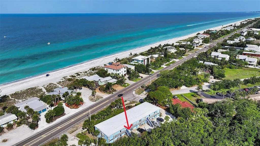 A renovated condo directly across from public beach access under $350,000. on Longboat Key? This is the one you've been looking for! Perfectly positioned for both personal enjoyment and strong rental income potential. Whether you're seeking a low-maintenance vacation escape or an income-generating property, this location checks all the boxes. Walk across the street to watch sunset on the sand, then stroll to Publix, Bayfront Park's tennis & pickleball courts, the library, or one of the island’s cozy dining spots. Everything your guests—or you—could want is right at your doorstep. The unit features a bright, open living space with tile flooring, a spacious bedroom, walk-in closet and parking. The well-maintained community offers low HOA fees and a relaxing island vibe that keeps guests coming back. Don’t miss out on this rare opportunity to own on Longboat Key—whether you're investing in your future or your lifestyle.