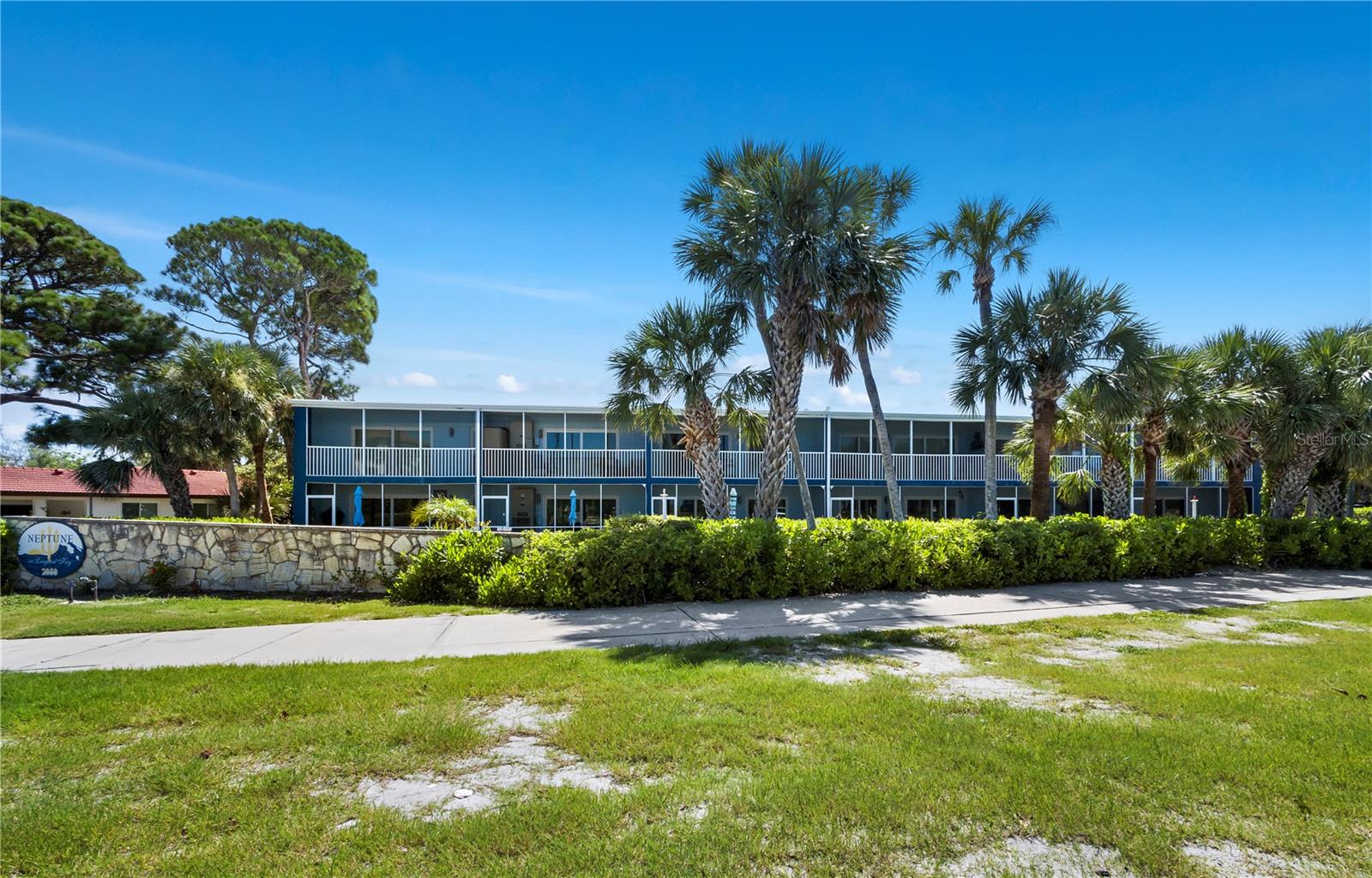 A renovated condo directly across from public beach access under $350,000. on Longboat Key? This is the one you've been looking for! Perfectly positioned for both personal enjoyment and strong rental income potential. Whether you're seeking a low-maintenance vacation escape or an income-generating property, this location checks all the boxes. Walk across the street to watch sunset on the sand, then stroll to Publix, Bayfront Park's tennis & pickleball courts, the library, or one of the island’s cozy dining spots. Everything your guests—or you—could want is right at your doorstep. The unit features a bright, open living space with tile flooring, a spacious bedroom, walk-in closet and parking. The well-maintained community offers low HOA fees and a relaxing island vibe that keeps guests coming back. Don’t miss out on this rare opportunity to own on Longboat Key—whether you're investing in your future or your lifestyle.