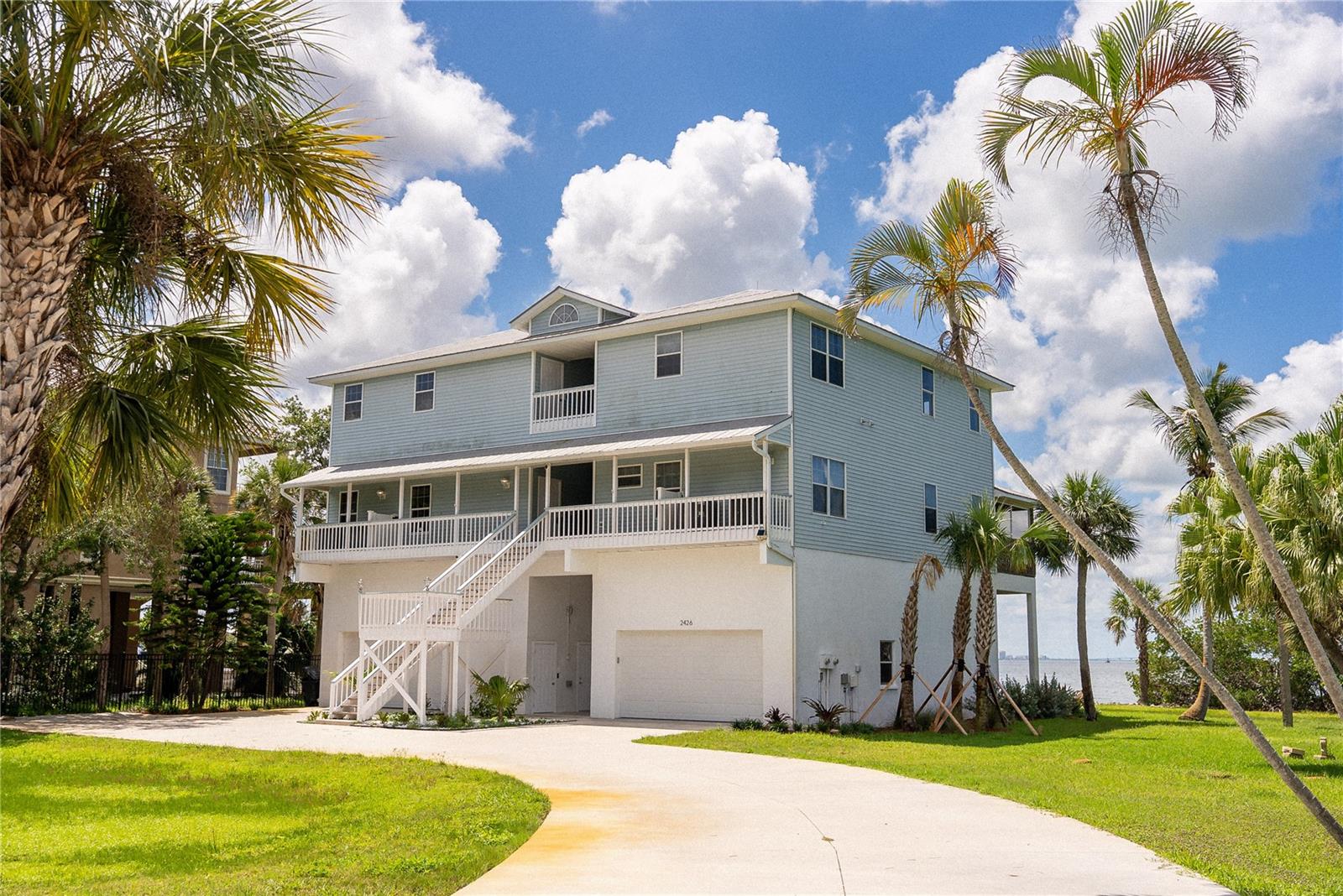 DIRECT WATERFRONT FOR LEASE - Two fully waterfront residences TREETOPS BAY being marketed under one listing with flexible leasing structure.

Exceptional turnkey FURNISHED estate on SARASOTA BAY offering a rare combination of Bayfront living, private dockage, and massive garage capacity. This unique property features TWO SEPERATE TOWNHOUSES. May be leased together or individually, ideal for extended families, executive housing, seasonal transitions, or tenants seeking a luxury waterfront compound with direct BOATING AND FISHING ACCESS.

The right-side residence #2424 offers 3 bedrooms, 2 full baths, and 1 half bath, along with a third-floor lookout level providing elevated BAY VIEWS and additional flex space. The left-side residence #2426 offers 2 bedrooms and 2 baths with comfortable waterfront living.

Positioned on over 400 feet of Sarasota Bay waterfrontage, the property includes a private boat dock and garage with each unit. Expansive outdoor areas - 1.31 ACRES with mature tropical landscaping, and open water views create a truly private, COASTAL ESTATE SETTING.

Both residences include oversized garages with exceptionally high ceilings capable of accommodating 6+ vehicles each, making the property ideal for car collectors, boating enthusiasts, hobby storage, or recreational equipment.

This fully gated private property provides a rare opportunity for luxury Bayfront living with flexibility rarely found in the Sarasota and Bradenton market. Owner prefers seven plus or longer annual lease terms.

Located close by to the IMG Sports Academy, Downtown Sarasota and St. Armand's Circle.

Monthly Rent rate for the left side townhouse 2426 unit $7500 plus utilities. Monthly Rent for the right side townhouse #2424 unit $8000plus utilities. Lease requires first, last and security. Units may be leased separately or together depending on tenant needs and owner approval. Call today to schedule a showing.