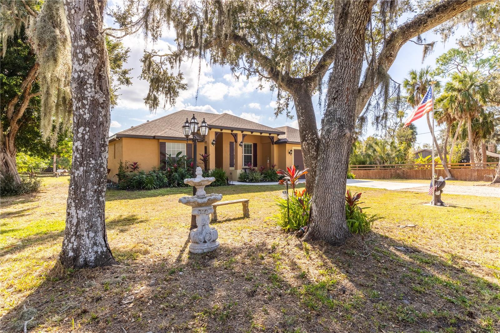 Rare opportunity to own a custom-built 2022 home on a fully fenced and cross-fenced one-acre horse property in town.  Homes in this area rarely come on the market. This spacious 3-bedroom, 2-bath residence offers 2,314 sq ft under heat and air and 3,229 sq ft total.  This must see home is thoughtfully designed with 10-foot ceilings, modern finishes, DETAILS, and an open & functional layout.

The home features a huge gourmet kitchen, separate dining room, two living areas, and spacious bedrooms.  This Fantasic Home is ideal for both entertaining and everyday living.  This home is clean, bright and natural light is abundant. Additional highlights include indoor laundry, and a 2-car garage. Step outside to a massive lanai overlooking the beautifully maintained acre with large mature trees, providing privacy and endless possibilities. 

The property includes a gated entry and offers plenty of room to build a pool or create your own outdoor oasis. Enjoy the rare combination of acreage and convenience—just a short drive or Uber ride to nightlife, entertainment, shopping, restaurants, beaches, Mote Marine, UTC, and more.  

Would be a dreamy place to start a large garden.  Peacocks roam the property.  PRIVATE!!! ULTRA PEACEFUL 

No HOA.  Bring you boat, RV, or horse trailer.  Plenty of room to build a barn or Giant Garage behind the home.   Home is on county water.  Has easy to install hurricane shutters.  

A truly one-of-a-kind in-town horse property blending modern construction, space, and lifestyle.