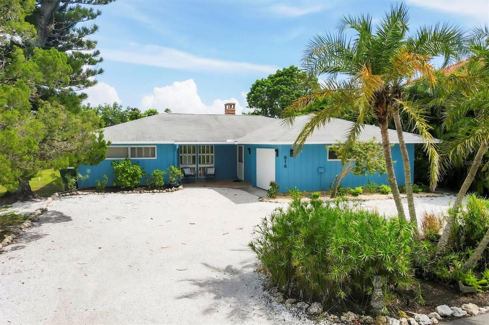 Welcome to your piece of Paradise! This beautiful canal front home is located in the idyllic and picturesque Longboat Key. A charming mid-century style cottage nestled in one of Longboat Key's most private and serene settings. This spacious 2 bedroom + Bonus room, 2.5 bathrooms with outdoor shower residence offers 1,755 square feet of luxurious living space perfect for those seeking a tranquil beach lifestyle. Recently impacted by Hurricane Helene, the home has undergone professional remediation and renovation including kitchen, bathrooms and pool.  The living area boasts an open floor plan with a cozy corner wood-burning fireplace that adds a warm touch, creating the perfect setting for snug evenings during the cooler winter months. The kitchen has been completely remodeled and equipped with all new cabinets, quartz countertops and appliances, offering plenty of space for culinary adventures. The master suite includes a cedar walk-in closet, an extra linen closet, and direct access to the pool area. In addition to the 2 bedrooms, there is a bonus room that could be made into a bunk room perfect for the little ones or teenagers to make their own retreat.  Lyons Lane is renowned for its tranquility and privacy, with lush mangroves lining the opposite side of the street, creating a natural, peaceful ambiance. This unique setting offers the best of both worlds: a serene retreat just moments away from the pristine beaches, boutique shopping, and fine dining that Longboat Key is famous for. Don’t miss this exceptional opportunity to own a slice of paradise.