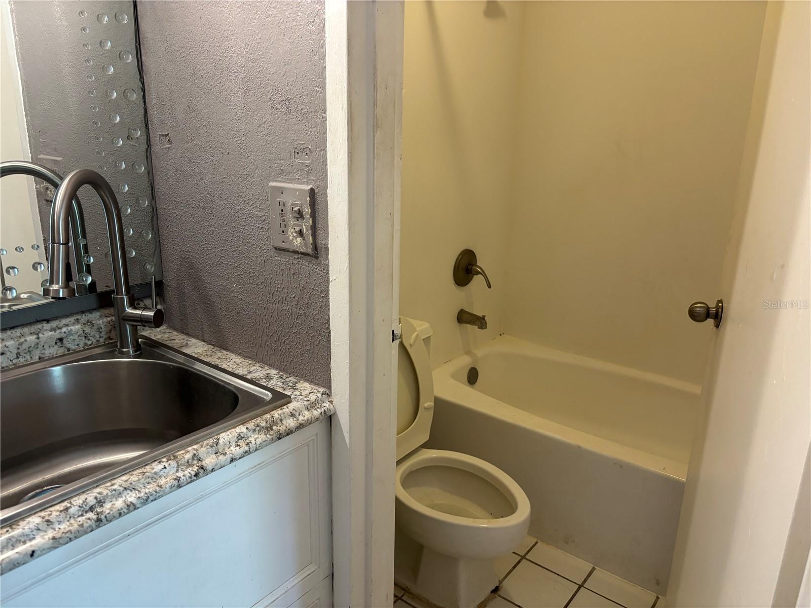 SAND LAKE COURTYARD CONDO - Residential