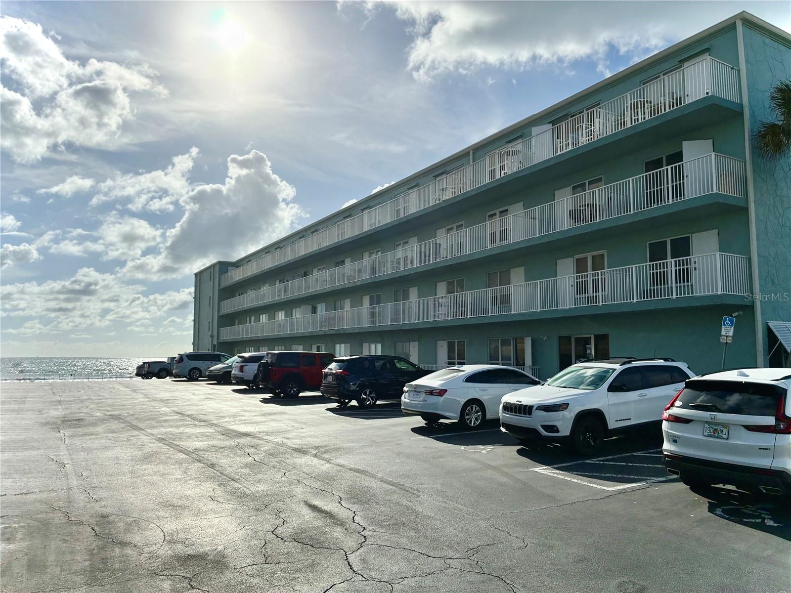 Daytona Beach Shores: ONE of Daytona Beach SHORES best kept secrets!! One OF ONLY 16 DIRECT OCEAN FRONT VERY RARE FIND. PLUS with LOW monthly fee of JUST $530 INCLUDES POWER, WATER, Sewer, INTERNET, Cable, pool and Building exterior YOU CAN LIVE ON THE BEACH... This beautifully remodeled condo has all the upgrades and super nice finishes real wood cabinets, FULL SIZE stove and refrigerator and tons of cabinet space. The great room has a like ''new'' murphy bed that conveys with the condo easy to pull out very convenient. Best part is walking out to your large balcony for a view that ONLY 16 owners get...DIRECT ocean front. From this balcony see the ALL NEW decking and sparkling Pool! The outside of the building was recently painted a beautiful sage green.