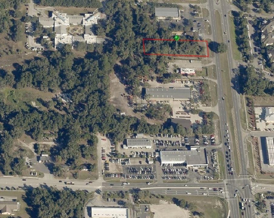 Rare development opportunity in the growing market of DeLand. This ±0.90-acre commercial parcel is ideally positioned on S Woodland Blvd (US-17/92), offering exceptional visibility and access for a wide range of business uses. Located less than 100 yards from the signalized intersection of US-17/92 and 15A, the site benefits from a high-traffic corridor with an estimated 60,000+ vehicles each day.
The property is zoned BR (Business Retail) Commercial, allowing for multiple commercial and mixed-use development options including restaurant, retail, service, or office uses. A major advantage of this offering is that restaurant plans have already been approved by the City and FDOT, significantly reducing the time and cost associated with pre-development and permitting.
With approximately 114 feet of frontage on S Woodland Blvd and a depth of approximately 450 feet, the lot provides ample space for building, parking, access, and site design flexibility. The rectangular configuration enhances usability and supports efficient layout for a variety of commercial concepts.
Surrounded by established businesses, residential neighborhoods, and continued growth throughout the DeLand area, this location presents an excellent opportunity for investors, developers, or owner-users looking to establish a presence along one of the area’s most heavily traveled roadways.
Utilities are believed to be available nearby (buyer to verify). Survey available upon request. High visibility, strong traffic counts, flexible zoning, and approved plans make this a standout opportunity for immediate or near-term development.
Don’t miss the chance to secure a prime commercial site in one of Central Florida’s steadily expanding markets.