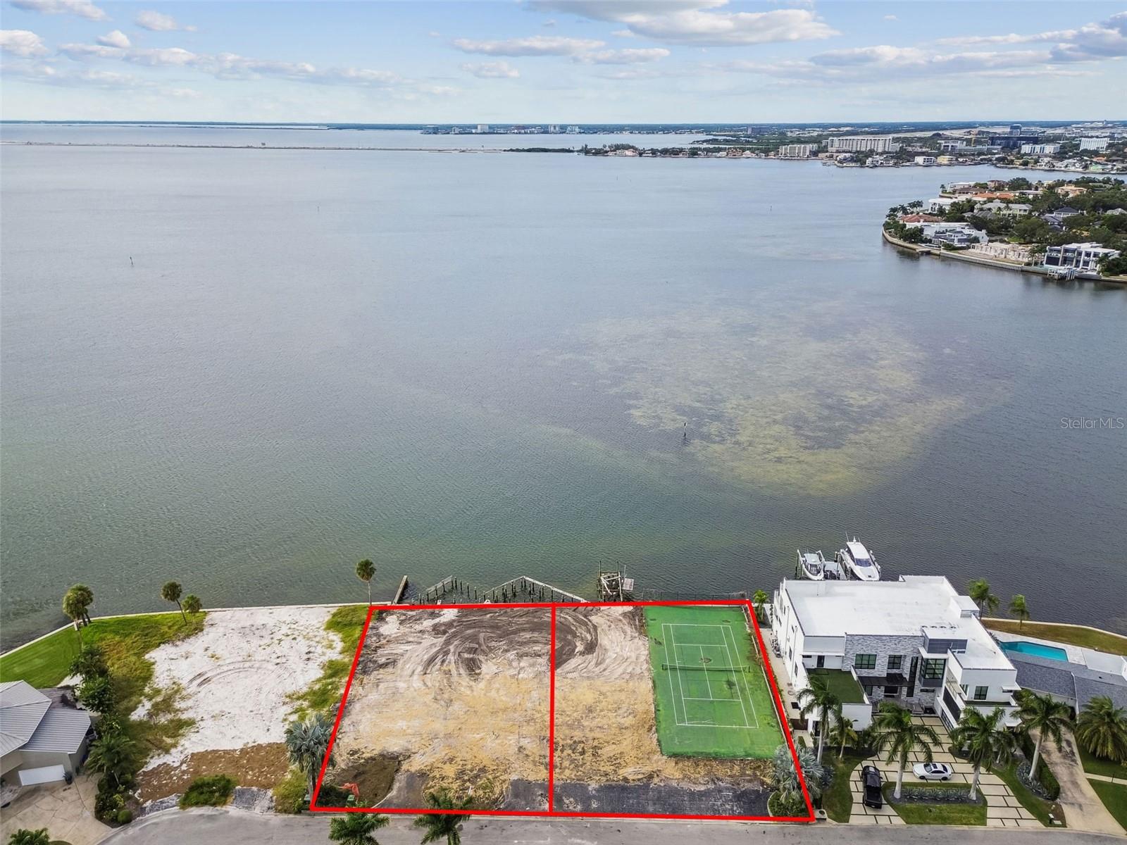 Exclusive Waterfront Estate Opportunity on Tampa Bay

Presenting a rare and exceptional opportunity to create a custom luxury estate on one of South Tampa’s most coveted waterfront settings. This half-acre double lot offers an impressive 200 feet of unobstructed frontage on Tampa Bay, framing panoramic open-water views and breathtaking evening sunsets.

Tucked away on a private, secluded finger, the property offers both tranquility and prestige, just minutes from Tampa International Airport, Hyde Park Village, Downtown Tampa, and International Plaza.

Design and build your resort-style dream home with expansive outdoor living, infinity-edge pool, and private dock—all showcasing the beauty of Tampa Bay. For added flexibility, the property can also be divided into two separate lots.

This is a once-in-a-lifetime offering—an extraordinary canvas for a world-class waterfront residence where every sunset feels like your own private masterpiece.