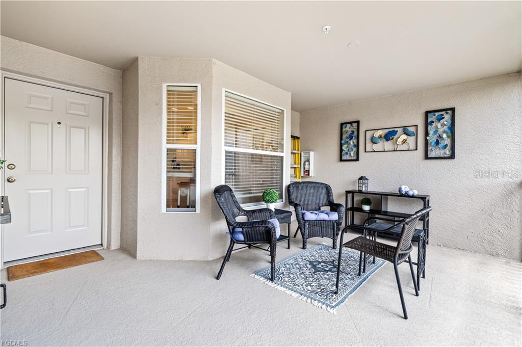 Experience the best of Southwest Florida living in this beautifully maintained end unit, second-floor SPACIOUS Abbey floor plan located in the highly sought-after Heritage Palms Golf & Country Club. Offered TURNKEY FURNISHED (with a few exclusions), this move-in ready condo allows you to start enjoying the Florida lifestyle from day one. Perfectly positioned to capture peaceful lake views and a sweeping golf course panorama from your back lanai, this light and bright space offers the ideal setting for morning coffee, evening cocktails, and year-round relaxation. The open floor plan offers a spacious layout with over 1600 sq. ft, volume ceilings with crown moulding, 2 bedrooms plus a den (office/craft room or additional guest room).The Abbey is the most sought after floor-plan for its space and functionality and has tile flooring throughout the main living areas and brand new carpet in the bedrooms. The large kitchen area showcases neutral colored Corian countertops, white cabinets and plenty of room for everyone to gather including a breakfast nook all overlooking the large living/dining area. Enjoy the added peace of mind and energy efficiency provided by impact-resistant windows and sliding glass doors along with roll down hurricane shutters on the back lanai. The front entry porch is also screened, creating refreshing cross breezes while providing multiple outdoor living spaces to enjoy the picturesque surroundings. Accessibility is enhanced with the convenience of a private electric chair lift, making access to this second-floor residence effortless. The attached garage offers valuable storage space for your vehicle, golf clubs, beach gear, and more. Heritage Palms Golf & Country Club is a premier resort-style bundled golf community featuring 2 18 hole championship golf courses, multiple resort-style pools, tennis courts, pickleball, fitness center, and a robust social calendar. Residents enjoy three full-service restaurants on site, along with the Cabana offering sandwiches and snacks, providing a variety of dining options without ever leaving the community. With water, sewer, cable and internet already included, living in Heritage Palms is easy, convenient and care free! Whether you're seeking a seasonal retreat, investment opportunity, or full-time residence, this exceptional property has so much to offer. Don't miss your opportunity to own a piece of paradise in one of Fort Myers' most desirable golf communities.