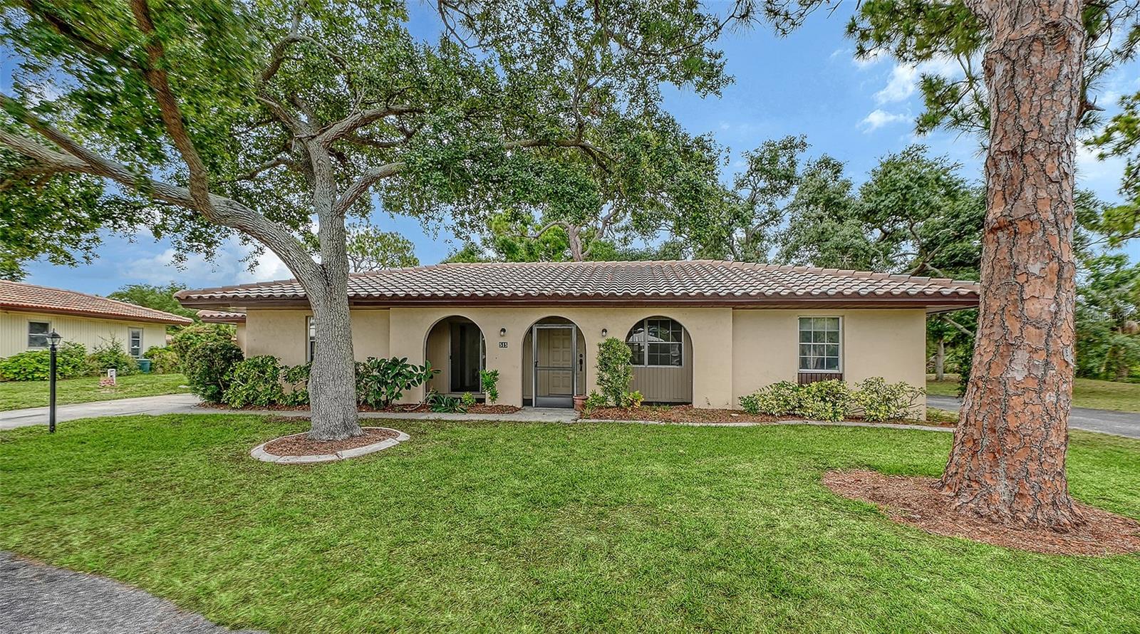Welcome to your new home in paradise.  New luxury vinyl just completed 2026, fresh paint on the ceilings and walls 2025, NEW ROOF 2025, newer appliances and fixtures, one car garage and so much more.  This villa is in the heart of Nokomis.  Almost 1500 square feet of light, bright and airy rooms, includes two bedrooms and two baths, an open concept living and dining room, eat in kitchen as well as additional bonus space. Tranquil front and back screened porches enhance the living space.  The AC was replaced in 2020, baths refreshed in 2021, garage door opener in 2023 and a whole house replumb in 2011.  The community takes care of the lawn maintenance for you.  Nothing left to do but move in and enjoy all the area has to offer.  Close to beaches, shopping, parks and the renowned Legacy Trail.   This is your chance to live the dream in warm and sunny Florida.