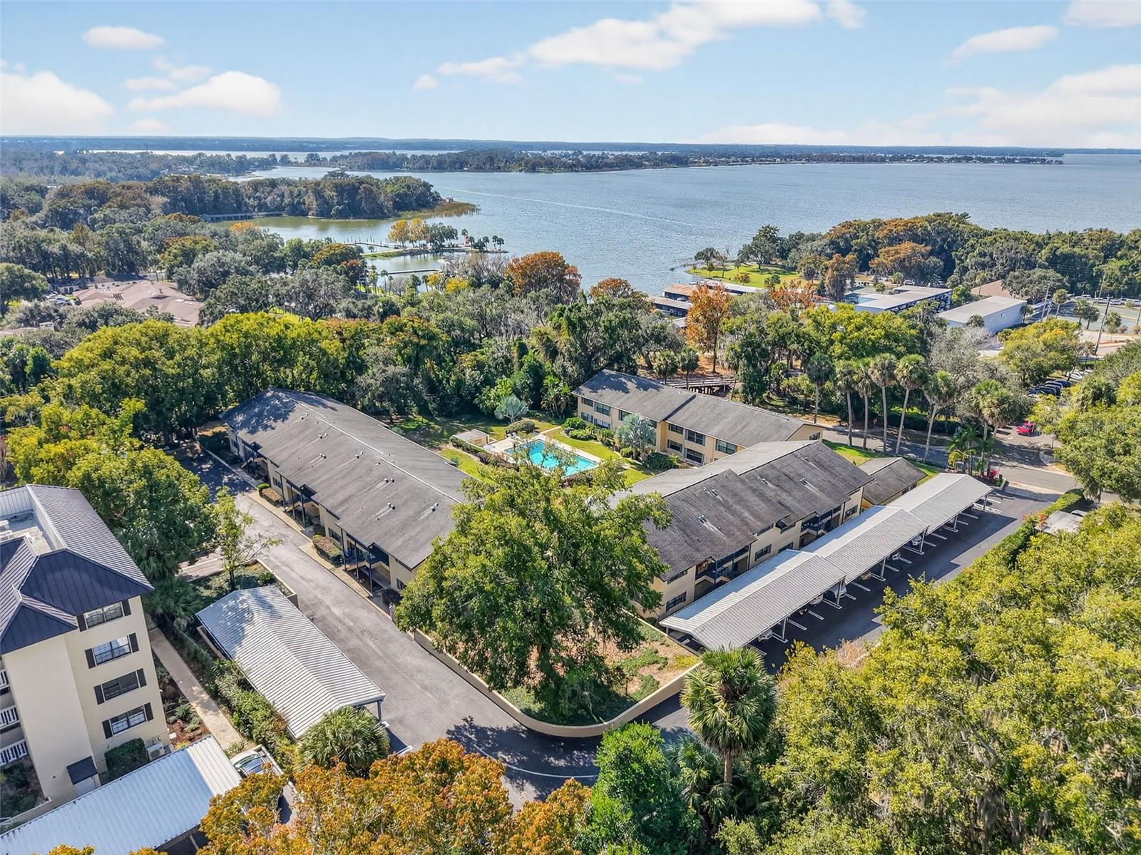 This beautiful condo is available and is ready for move-in! Enjoy the newly painted interior, stainless-steel appliances, new window treatments, new hot water heater and the washer/dryer combo unit included. Relax and cool off in the community pool, a great way to beat the heat! Explore the town being only walking distance from historic, Downtown Mount Dora! One covered parking space included, with additional parking in guest spaces. No age restrictions here! Included in Rent: condo fees, water/sewer/trash, building, property and pool maintenance. Rental Requirements: Minimum combined income of $5,400/month, (6) six months of steady income for each applicant, application for approval by condo board, renter's insurance. Cats and small dogs may be considered only if pets are spayed/neutered and up to date on all vaccines. Non-smokers only.
