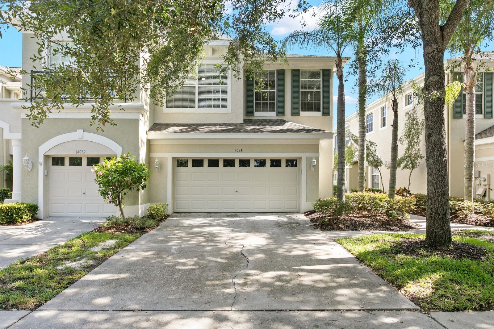 Nestled within the desirable gated community of Hampton Chase, this waterfront 3-bedroom, 2.5-bath townhome with a 2-car garage offers the perfect blend of comfort, style, and low-maintenance living. From the moment you enter, you'll appreciate the bright, open floor plan filled with natural light and enhanced by tasteful updates throughout. The spacious Living and Dining Room combination features wood flooring, crown molding, fresh interior paint, updated lighting, and tranquil water views. Sliding glass doors lead to a covered and screened lanai, as well as an additional open patio, creating the ideal setting for morning coffee, outdoor dining, or simply relaxing while enjoying picturesque pond and fountain views.

The well-appointed eat-in Kitchen is designed for both everyday living and entertaining, offering stainless steel appliances, granite countertops, wood cabinetry with select glass-front accents, a breakfast bar, double sink, closet pantry, and updated lighting. A private first-floor office with wood flooring and crown molding provides an ideal work-from-home space. The first level also includes a convenient half bath, hall closet, and a generously sized under-stair storage closet.

Upstairs, you'll find three spacious bedrooms, all featuring new carpet, crown molding, and updated lighting. The impressive Primary Suite serves as a true retreat, complete with a separate 9' x 10' sitting area and private covered, screened balcony overlooking the peaceful water views. The ensuite bath features dual sinks, wood cabinetry, a garden tub, separate shower, and tile flooring, while a large walk-in closet provides ample storage. Two additional bedrooms, each with walk-in closets, share a full bath with wood cabinetry and a tub/shower combination. For added convenience, the laundry room is located on the second floor near all bedrooms and includes the washer and dryer, while a linen closet provides additional storage.

Additional features include a garage pre-plumbed for a water softener and numerous recent updates, including new interior paint, carpeting, lighting, ceiling fans, and toilets in 2026, a new HVAC system in 2024, and a new roof in 2021.

Residents of Hampton Chase enjoy a peaceful, well-maintained community with a heated year-round swimming pool, playground, and welcoming neighborhood atmosphere. Ideally situated near top-rated schools, shopping, dining, entertainment, Tampa International Airport, and the Gulf Coast's award-winning beaches, this home offers an exceptional combination of location, lifestyle, and value.