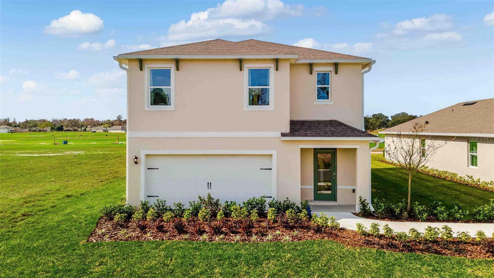 Under Construction. Wynwood presents the Robie. This impressive all concrete block construction, two-story plan features a versatile floorplan to fit your needs. A spacious open-concept first floor includes a well-appointed kitchen with sleek stainless-steel appliances overlooking the living and dining area. Just off the living room you will find bedroom two and a full bathroom. As you move upstairs you are greeted with a nice sized living space to utilize for work or play. Bedroom one is located just off the loft space and includes a spacious walk-in closet and an en suite bathroom with a double vanity. Three additional bedrooms share a second upstairs bathroom and linen closet. Your laundry room is located on the second floor as well as extra storage closets. Like all homes in Wynwood, the Robie includes Smart home technology package which allows you to control your home with your smart device while near or away. 

*Photos are of similar model but not that of exact house. Pictures, photographs, colors, features, and sizes are for illustration purposes only and will vary from the homes as built. Home and community information including pricing, included features, terms, availability and amenities are subject to change and prior sale at any time without notice or obligation. Please note that no representations or warranties are made regarding school districts or school assignments; you should conduct your own investigation regarding current and future schools and school boundaries.*
