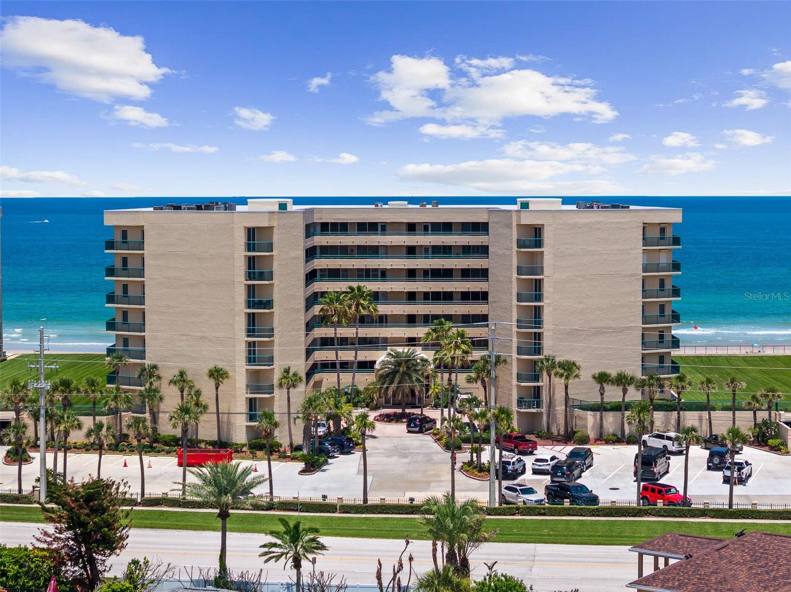 Don't miss your chance to live like you're on vacation every day at this fantastic FIRST FLOOR FULLY REMODELED condo offering a gorgeous OCEANFRONT VIEW and just a short walk to DIRECT BEACH ACCESS! The luxury beach life calls you to this impeccable 3 bedroom, 3 bath condo in the Towers Five community of Ponce Inlet. From floor to ceiling, inside and out, this condo has it all. Entertain with ease in this home’s fabulous flowing floor plan boasting spacious living and dining spaces and the living space extends outside to the patio overlooking the marvelous view of the Atlantic Ocean and world-class views of the beach. Cook with ease in the gourmet kitchen adorned with gorgeous counters, loads of beautiful cabinetry, stainless steel appliances and breakfast nook. When night falls, the large master suite is an oasis with walk-in closet and ensuite bath with walk-in shower, and double vanity sinks. The condo also features 2 spacious guest bedrooms, 2 additional beautiful full baths, separate laundry room and enclosed front lanai with A/C offering a great space to welcome your guests or an additional living area. Buyers here will have amazing peace of mind with a NEW A/C unit, all NEWER windows and sliders, Newer Hot Water Heater (5 years old), and NEW motorized Hurricane Shutters. Best of all, your new lifestyle here will be unmatched. Enjoy breathtaking ocean views from inside your condo or head outside to enjoy endless hours playing in the surf and sand along the pristine beach that's just outside your door. Or just lose track of time enjoying all the fabulous resort style amenities at your new Towers Five condo community, like the oceanfront pool, spa, fitness center, clubhouse, pickleball court, tennis court, and underground parking. With this beautiful move-in ready condo, you can finally stop dreaming about the beach life and start LIVING IT. The condo building has a newer roof, and a renovated lobby. Max of 2 pets allowed with NO weight limit.