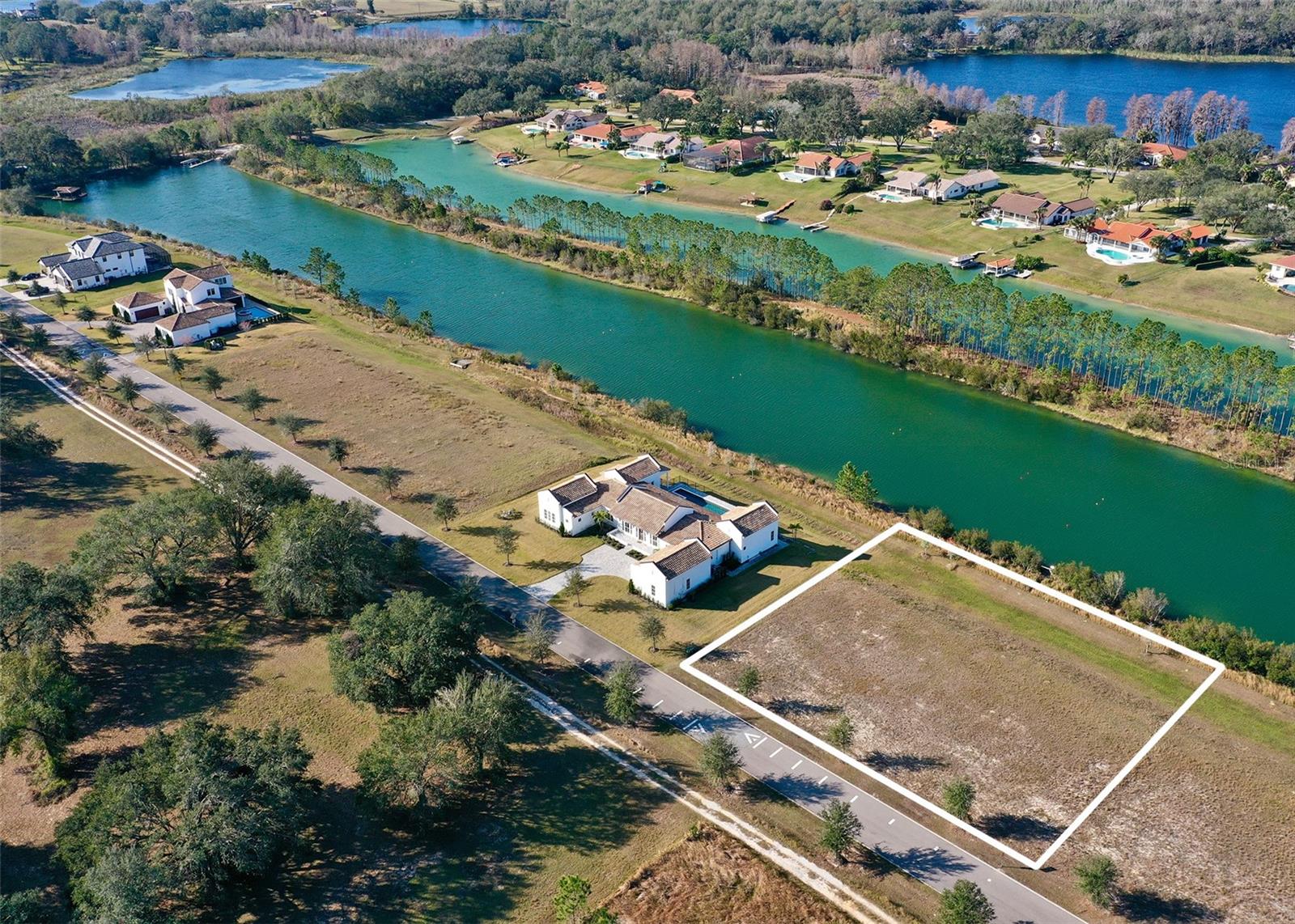 Welcome to Tiger Paw Estates, a premier gated community nestled on the serene shores of Lake Pierrot. With just eleven (11) exclusive properties, this community offers a rare opportunity to build your Dream Home on one of the finest waterski lakes in Florida. Six (6) stunning homes already enhance this peaceful neighborhood, offering a perfect blend of luxury and natural beauty. Becoming a homeowner grants you the privilege of joining the waterski club, allowing you to enjoy Lake Pierrot's premium waterski conditions. Enjoy the freedom to plan your future at your own pace, as there is no time restriction to build. Design your dream home with a minimum of 2,000 square feet of air-conditioned living space, ensuring comfort and quality within this exclusive community. A total of 60 feet separate the properties between each other. An exceptional waterski community featuring two renowned waterski schools just across the street, Swiss Waterski Resort and MC Ski Center, perfect for those seeking expert coaching right near your doorstep. Known as "The Choice of Champions," Clermont is renowned for its rolling hills, pristine lakes, and its reputation as a global training hub for triathletes, runners, and cyclists. Residents of Tiger Paw Estates enjoy convenient access to Downtown Clermont, featuring charming restaurants, unique shops, and the magic of Disney Parks just a 45-minute drive away. Don’t miss this rare opportunity to construct your dream escape in a community that embodies the best of Florida living.