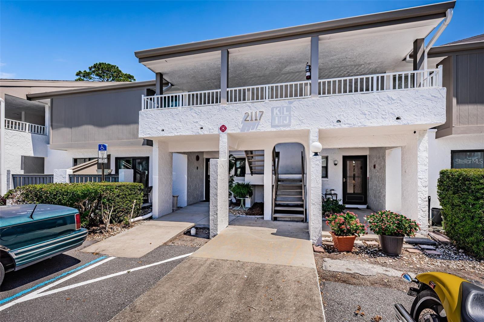 Welcome to this beautifully maintained 2-bedroom, 2-bath condo located in a desirable pet-friendly community in St. Petersburg. This inviting home features hurricane impact windows and major system updates, including a well maintained and up to date A/C and water heater, water filtration system, and Martha Stewart Cabinets, offering peace of mind for years to come. Enjoy peaceful mornings and relaxing evenings on your patio overlooking the lush greens of the St. Petersburg Country Club golf course. Residents enjoy a wide range of amenities, including a resort-style pool, clubhouse, and tennis courts. The HOA fee provides exceptional value, covering cable TV, high-speed internet, water, sewer, trash, building insurance, exterior maintenance, and access to community amenities. Centrally located between St Pete beach and the Don CeSar, Eckerd College, shopping, dining, hospitals, and Downtown St. Petersburg, this home offers the perfect blend of comfort, convenience, and Florida lifestyle living.
