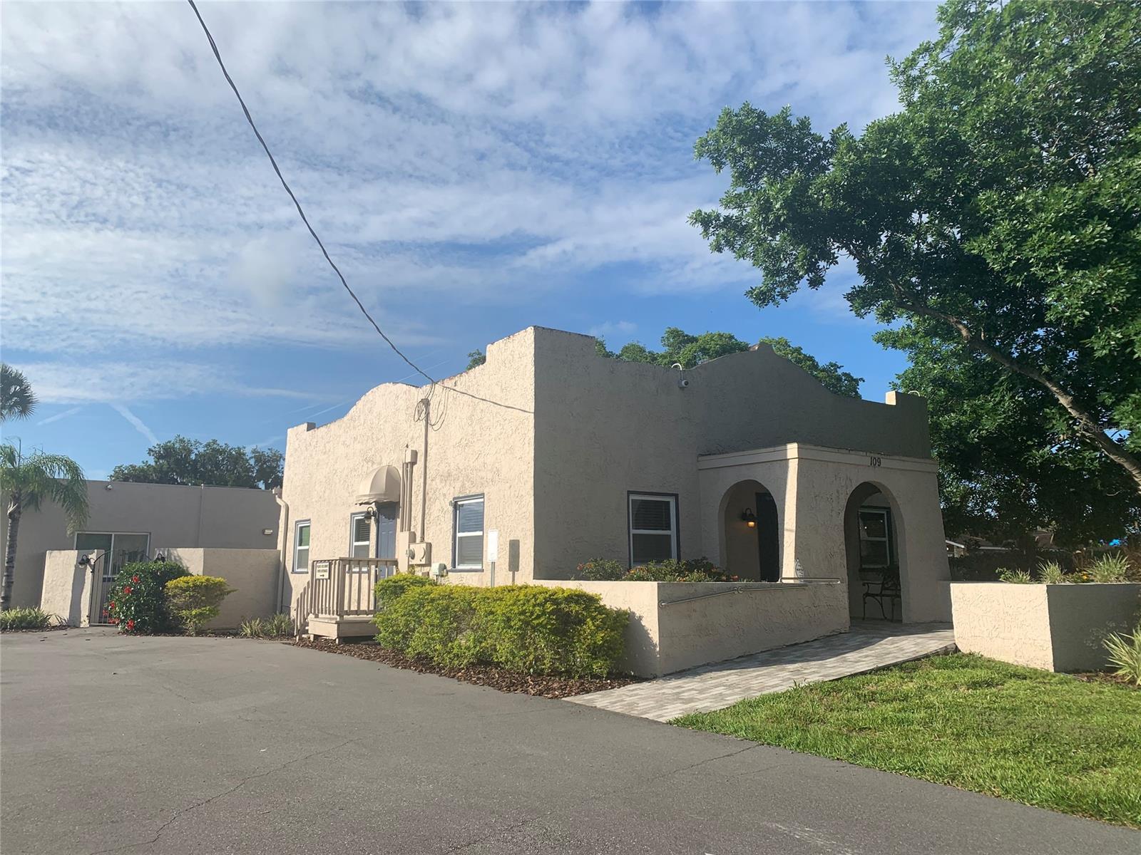 Multi-use Zoning Professional Building. Variety Of Business Uses As Well As Residential ..Currently set up as a doctors office with waiting room, reception area, billing office, main office, nursing
area, procedure room, lab, kitchen, and five examination rooms. 
Centrally Located Between New Smyrna Beach And Edgewater. Visible From US 1. Gated walled courtyard.
The entire office is wired for internal networking.
Currently has fiberoptic internet.
The office has an existing alarm/camera system on a backup gas generator.
Hurricane proof room suited for computer servers.
Has a Fully operational kitchen.
Currently with 1 full bath and ½ bath (set up for additional ½ bath).
Plumbing throughout the entire office with water serving 5 additional rooms.
Parking lot resurfaced in 2019/ 2 Car Garage.
All new impact windows added in 2020.
New flooring throughout.
Entire interior painted 2019.
Exterior painted 2018.
Major tree work performed in 2021.
Front entrance retiled 2018.
Versatile layout compatible with Medical / Dental Office. ;Water: City