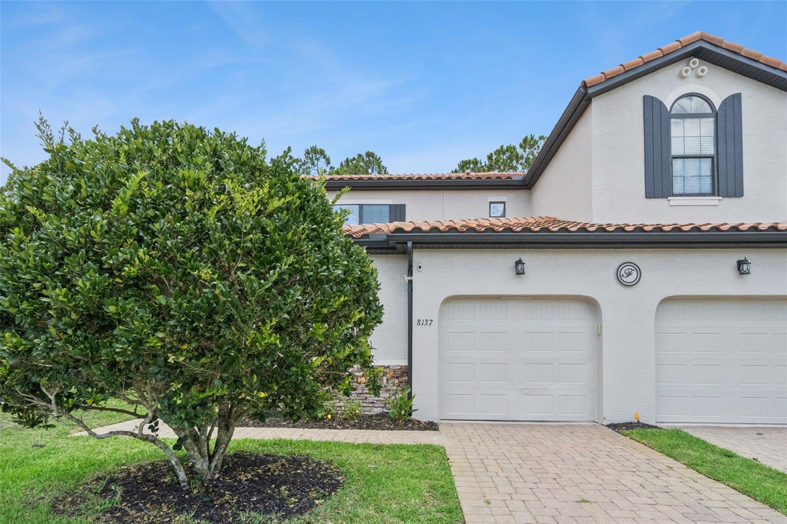 This upgraded 4-bedroom, 3.5-bath corner townhouse in the gated Fountains at Champions Gate delivers the rare combination of privacy, premium finishes, and income potential. Dual-zoned for short-term rental or primary residence and being sold fully furnished and turnkey — just close and start generating revenue.
Tile floors throughout the main level give the home a clean, polished foundation, while brand-new luxury vinyl flooring runs up the staircase and across the entire second floor for a fresh, modern feel. The gourmet kitchen features granite countertops, 42" solid wood cabinetry, glass-tile backsplash, and stainless steel appliances — and every bathroom carries matching granite countertops and tile floors, creating a seamless, high-end finish throughout. The first-floor primary suite includes a generous walk-in closet, while three additional bedrooms and two full baths round out the upper level. The private corner lot backs up to a peaceful conservation area with no rear neighbors — a feature guests and residents alike will love.
The recently renovated community clubhouse elevates the lifestyle further with a resort-style pool, spa, and fitness center. Add in the one-car attached garage, gated entry, and 2,060 sq ft of move-in ready living space, and this property is as effortless to own as it is to enjoy. Minutes to Disney, I-4, world-class dining, multiple golf courses, and major shopping. Schedule a tour today!