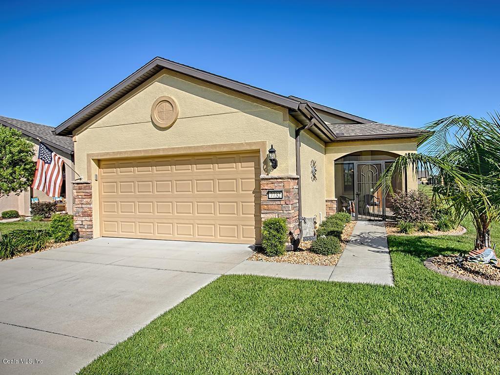 Welcome to effortless resort-style living in Stone Creek, Ocala's premier gated 55+ golf community. This beautifully maintained Noir Coast model offers the perfect blend of comfort, style, and low-maintenance living, with lawn care and irrigation included through the HOA.

Inside, you'll find an open floor plan filled with natural light, diagonal tile flooring throughout the main living areas, and a spacious gathering room that flows seamlessly into the sunroom and expansive screened birdcage lanai overlooking a peaceful nature berm—an ideal setting for morning coffee, evening relaxation, or entertaining friends.

The kitchen is both functional and inviting, featuring rich espresso cabinetry, granite countertops, stainless steel appliances, a raised comfort-height dishwasher, a beautiful glass tile backsplash, recessed lighting, and a cozy breakfast nook overlooking the living space. As you move through the home, you'll appreciate the fresh interior paint and updated modern ceiling fans that complement the home's neutral finishes and create a bright, welcoming atmosphere.

The Owner's Suite offers peaceful backyard views, a generous walk-in closet, and an ensuite bath with a granite vanity and a glass-enclosed walk-in shower.

Outside, attractive brick accents, professionally designed landscaping, decorative curbing, and rock beds create outstanding curb appeal, while the oversized screened birdcage lanai extends your living space year-round.

Living in Stone Creek means enjoying championship golf, resort-style pools, pickleball and tennis courts, a state-of-the-art fitness center, walking trails, clubs, entertainment, and countless opportunities to stay active and connected—all within one of Ocala's premier active adult communities.

Whether you're looking for a full-time residence or the next chapter of retirement, this home offers the comfort, convenience, and lifestyle that make Stone Creek one of Ocala's most sought-after 55+ communities.