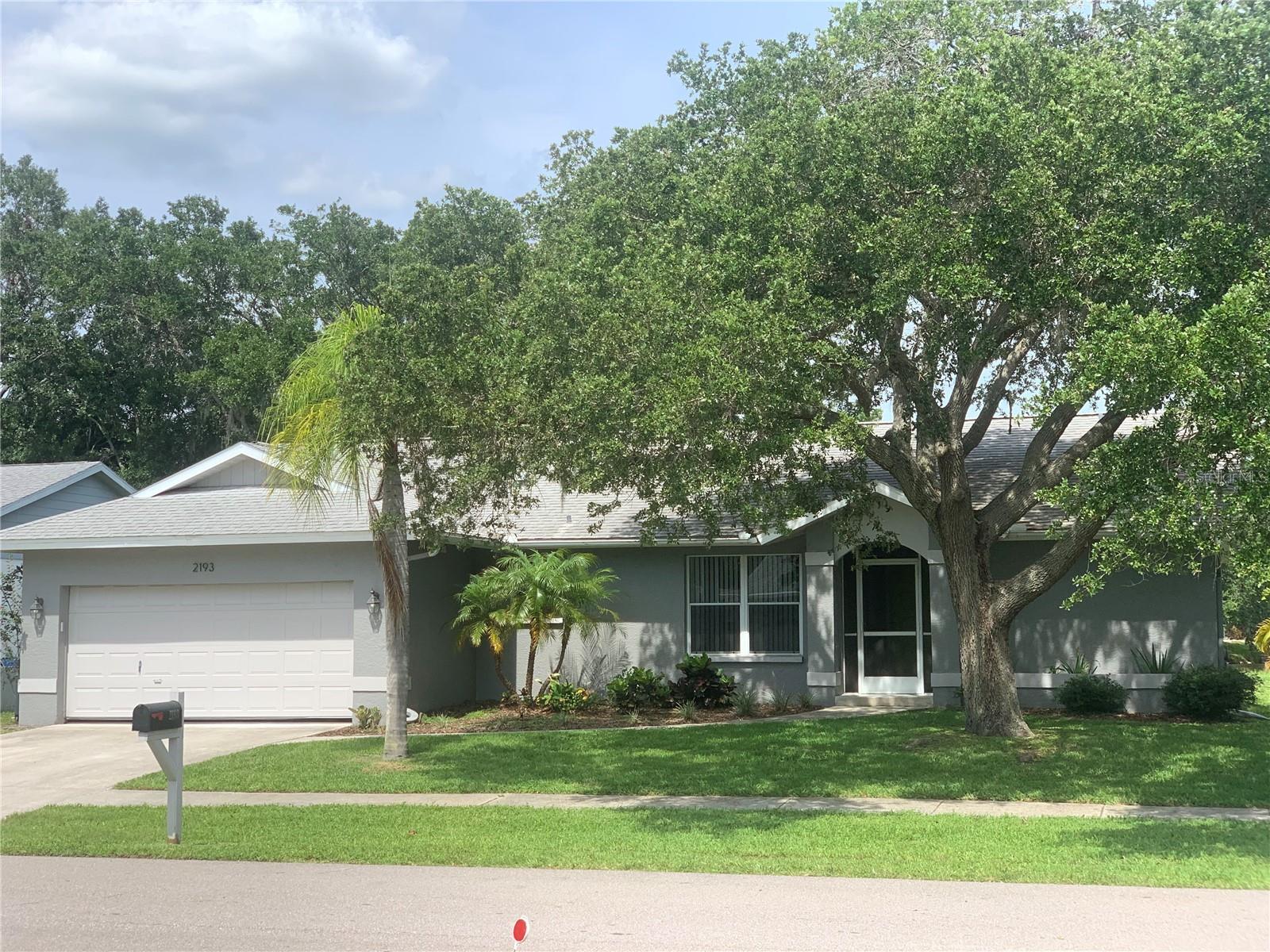 Available immediately. Renovated inside and out! 3-bedroom, 2-bath, two-car garage home in the highly desirable community of Colonial Oaks. Landlord will discount rent by $50 a month if received by the 4th of each month. Enjoy the tranquil lake view from your screened lanai or sit by your cozy fireplace in the winter. New quartz countertops (not pictured in photos), Newer stainless steel appliances, new tile throughout, exterior and interior paint, ceiling fans and fixtures. Split plan with a roomy primary suite with a generous walk-in closet, garden tub, newly tiled shower, and full vanity. Vaulted ceilings with popcorn removed and new paint. The interior roomy laundry room has plenty of storage and with access to the garage and kitchen. Plenty of front yard and large backyard space. Colonial Oaks Park is located within the community. It is run by Sarasota County and it offers many varied activities including tennis and basketball courts, gym, picnic tables with BBQ grills, walking trails, infant and pre-school activities as well as teen activities and more. You'll be just minutes from shopping, access to I-75 and Doctors Hospital. A sought-after school district with a short drive to Siesta Key Beach, downtown Sarasota or Lakewood Ranch Main Street.

1st month rent and Security deposit are due at signing. 1 cat or 1 dog allowed with non-refundable pet deposit depending on breed and size.