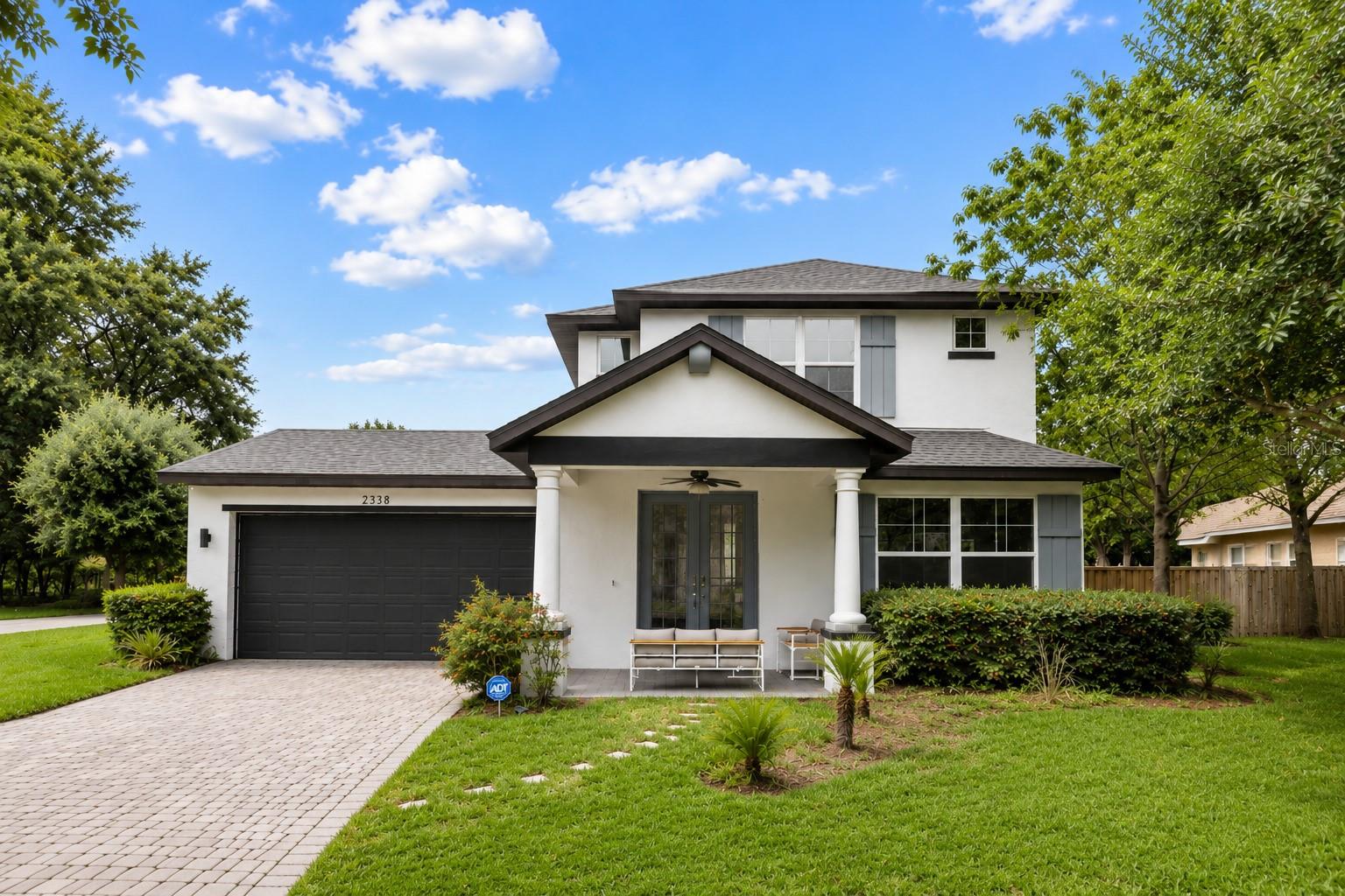 Ideally located in the heart of Orlando, this beautifully maintained 2019-built home places you just minutes from SODO, Downtown Orlando, Delaney Park, the Hourglass District, Orlando Health/ORMC, and major highways. Zoned for the highly sought-after Blankner K-8 and Boone High School, and just a short walk to both campuses, this exceptional location offers the perfect blend of convenience, lifestyle, and long-term value.

Situated on a desirable corner lot, this move-in-ready home offers 3 bedrooms, 2.5 bathrooms, and 1,806 square feet of thoughtfully designed living space. An impressive double-door entry welcomes you into a bright, open floor plan featuring high ceilings, abundant natural light, and wood-look tile throughout the home with no carpet.

The gourmet kitchen is designed for both everyday living and entertaining, featuring quartz countertops, a large center island, built-in oven and microwave, cooktop with vent hood, stainless steel appliances, abundant cabinetry, and an oversized walk-in pantry. Upstairs, the spacious primary suite includes a walk-in closet and a beautifully appointed en-suite bath with dual vanities and a tiled walk-in shower. Every bedroom closet has been thoughtfully upgraded with custom shelving and drawers, providing exceptional organization and storage.

Enjoy Florida living year-round from the screened-in covered lanai overlooking the fully fenced backyard, perfect for relaxing or entertaining. Additional highlights include a two-car garage, irrigation system, public utilities, and no HOA.
Modern construction, designer upgrades, top-rated schools, and an unbeatable location make this a rare opportunity to own in one of Orlando's most desirable neighborhoods.