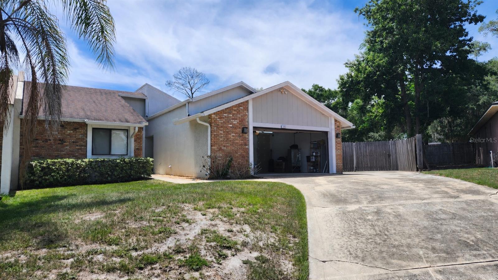 Short Sale. Spacious 3BD/3BA pool home in Errol Estate's Magnolia Woods with great bones and plenty of potential. Features include a remodeled kitchen with marble counters, custom soft-close cabinetry, stainless steel appliances, and breakfast bar. Primary suite offers vaulted ceilings, private lanai access, dual-sink vanity, soaking tub, and walk-in closet. Open floorplan with soaring ceilings flows to a private backyard with screened pool/spa, covered patio, outdoor kitchenette, and fully fenced oversized yard. Property needs TLC and is being sold as-is — SELLER is motivated. Bring your vision and make it your own.
