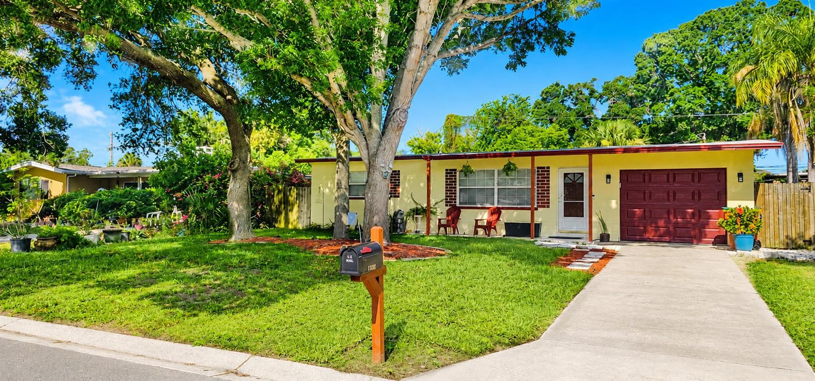 Welcome to 12346 114th Street! This inviting 2-bedroom, 2-bathroom block home offers a flexible bonus room that can serve as a third bedroom, home office, den, or guest space. The seller reports approximately 1,080 square feet of total living space, including the additional enclosed area; public records currently reflect 864 square feet. Buyers and buyers agents are encouraged to verify all measurements and square footage. Inside, you will find an open, comfortable layout with luxury vinyl and ceramic tile flooring, abundant natural light, and a brand-new 2026 three-ton central HVAC system. Enjoy the fenced backyard and spacious wood deck, offering plenty of room to entertain, unwind, and enjoy the Florida lifestyle. Additional features include an attached garage and no HOA. With flexible living space and plenty of potential to make it your own, this home is ready for its next owner.