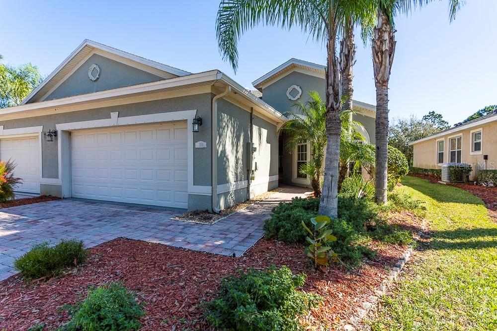 Nestled between two strips of forested permanent preserve, boasting 38 villa homes located along a secluded cul-de-sac, and loaded with numerous upgrades, Eagle Marsh North, a golf course community in Daytona Beach is a sought after place to live and easily one of the best values in town. Standards like brick paver driveways, maple cabinetry, marble tubs, high ceilings, and landscaping are a few villa features. HOA maintains all lawn areas, paints the exterior every 5 years and maintains the roof. Plus hurricane shutters, epoxy floor in garage and FL room; skylight in kitchen, professional closet systems, FL room under air, new roof and gutters December 2018. ;Water: City