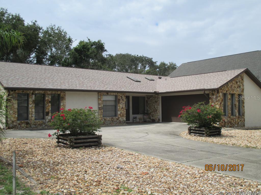 EXPECT TO BE IMPRESSED! THIS IS THE LARGE BEACHSIDE HOME YOU HAVE BEEN WAITING FOR! LOW MAINTENANCE YARD WITH ROOM FOR A POOL AND A TURN AROUND DRIVEWAY...BRAND NEW ROOF AND NEWER AC AND HOT WATER HEATER...ORIGINAL OWNER AND CUSTOM BUILT HOME WITH LARGE OPEN LIVING/DINING AREA AND LARGE 12X35 FLORIDA ROOM WITH LOTS OF POTENTIAL...CLOSE TO SHOPPING AND OF COURSE THE BEACH! THE LARGE KITCHEN HAS A LARGE EAT IN BREAKFAST AREA AND THE FLOORS ARE LOW MAINTENANCE WHITE VINYL TILE AND CARPET IN BEDROOMS. VERY EASY TO SHOW! ;Water: City