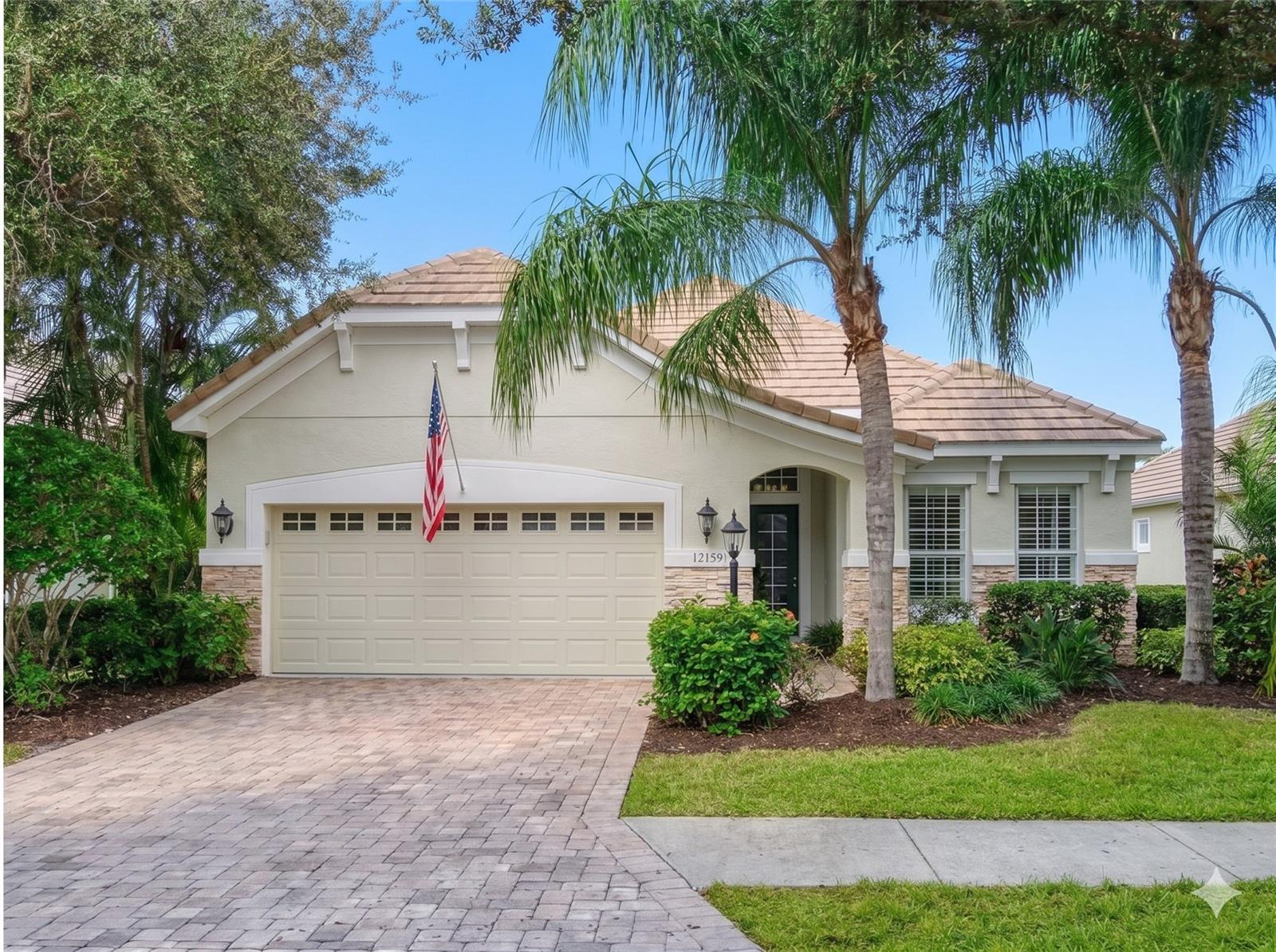 Discover refined Florida luxury living in this extensively remodeled 3-bedroom, 2-bath residence with a private home office, originally built by award-winning Neal Communities and thoughtfully reimagined in 2024. Located behind the gates of the prestigious Lakewood Ranch Country Club, this impeccably updated 2,011 sq. ft. single-level home blends timeless elegance with modern comfort, all set against serene long water and preserve views.
An open-concept floor plan welcomes you with soaring 10-foot tray ceilings, wide-plank engineered hardwood flooring, designer lighting, and exceptional craftsmanship throughout. The gourmet kitchen is designed to impress, featuring a Miele gas range with warming drawer, Thermador refrigerator and dishwasher, Wolf microwave drawer, and custom solid wood dovetail, full-extension drawers with soft-close cabinetry. A dramatic quartz waterfall island with wine refrigerator creates the perfect space for entertaining and everyday living alike.
The luxurious primary suite offers a spa-inspired retreat with separate designer white vanities with added storage, marble flooring, a zero-entry frameless glass shower, custom closet systems, and thoughtfully designed built-in organization that combines elegance with functionality. The secondary bedrooms also feature custom closet systems, while the sophisticated home office with French glass doors and plantation shutters provides flexibility for guests, remote work, or additional lounge space.
Outdoor living is equally exceptional with a private lanai featuring a solar-heated pool finished in Krystalkrete® Krystal Blue Quartz, travertine decking, and a fully equipped outdoor kitchen complete with a built-in gas grill, granite countertops, and beverage refrigerator. Recent pool enhancements include a new Salt Cell System and SuperFlo Pump, a new filter cartridge, an updated solar pool equipment inspection, and the installation of a new GVA-24 actuator valve and Hayward GL-235 power station—providing added efficiency, reliability, and peace of mind.
Additional upgrades include fresh interior and exterior paint, a Moen electronic remote tankless bidet, ADT security system, retractable sunshades, and an LG ThinQ WashTower. Every detail of this residence has been carefully curated to create a true resort-style experience in one of Lakewood Ranch’s most sought-after communities, just minutes from championship golf, fine dining, shopping, and world-class amenities.
