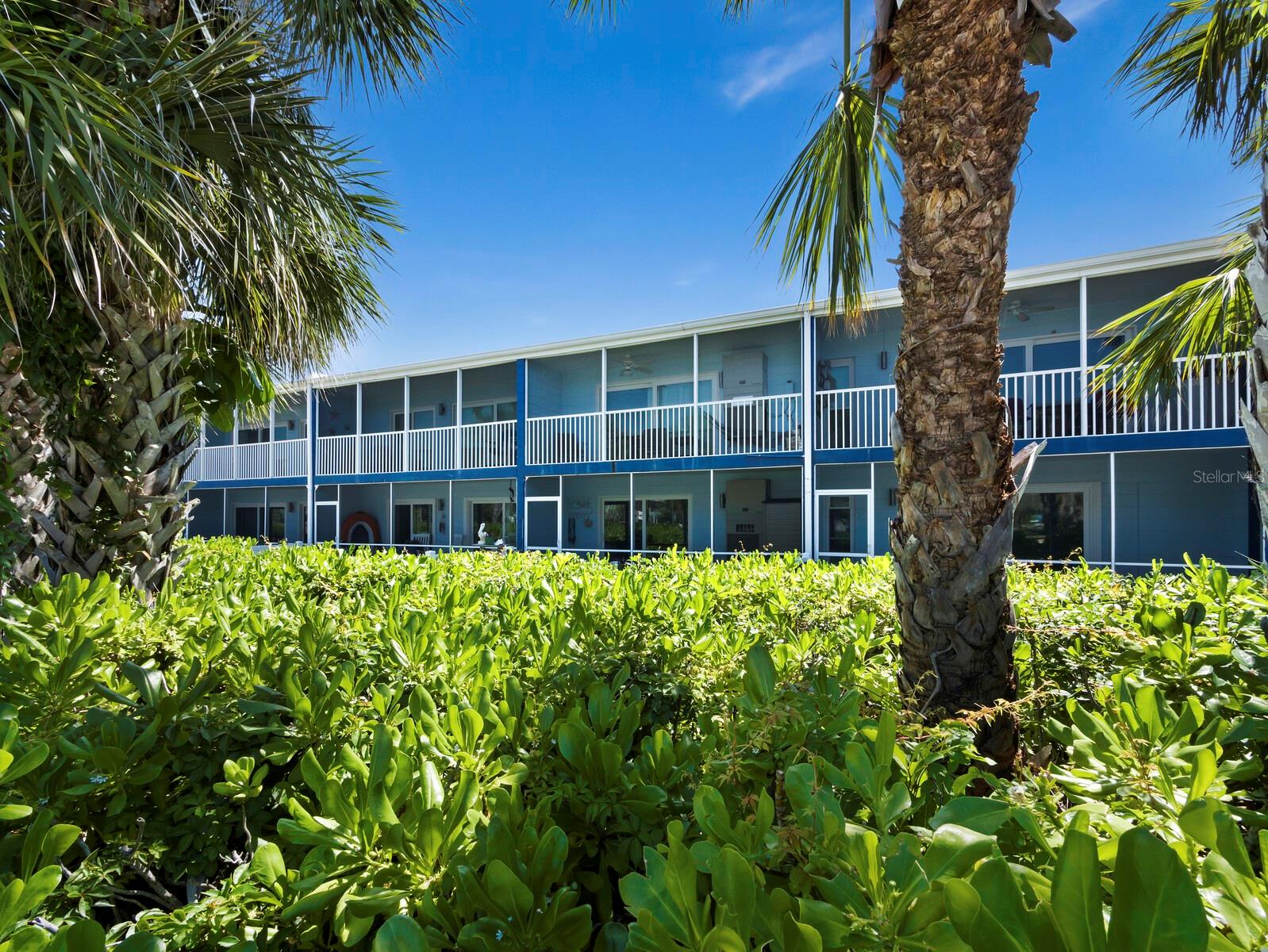 Welcome to Neptune on Longboat Key — a charming community where coastal comfort meets relaxed island living. This bright 2-bedroom, 1-bath residence features tile flooring throughout, a full kitchen with quality appliances, and a beautifully tiled bath. The open living and dining area leads to a screened lanai surrounded by lush tropical landscaping — the perfect spot to enjoy morning coffee and Gulf breezes. Neptune is a boutique, 12-unit complex offering direct beach access and tropical grounds. Owners enjoy excellent rental flexibility with a 1-month minimum lease, up to 12 times per year. Ideally located near Publix, St. Armands Circle, and the dining and cultural attractions of Sarasota — perfect as a vacation retreat, income property, or year-round island getaway.