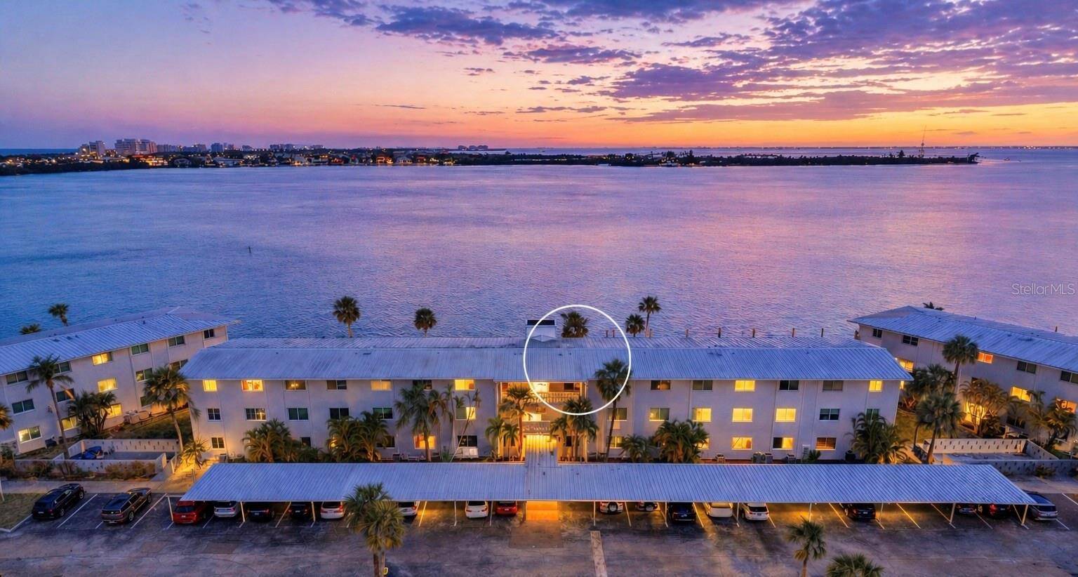 2/1 condo in Sarasota Harbor West in Sarasota. Top-floor waterfront with unobstructed bay views. 55+ community with boat slips. 1 designated parking space. 
This 2-bedroom, 1-bath condo in Sarasota Harbor West offers top-floor waterfront living with unobstructed bay views from 816 square feet. Positioned on the third floor, the elevation provides wide water vistas and steady coastal breezes. Located in a 55+ community with elevator access, the property supports low-maintenance ownership in a defined waterfront setting.
The interior layout is efficient and light-filled, with the main living area oriented toward the bay to maximize water views. The two-bedroom configuration allows for flexible use, including full-time residence or seasonal occupancy. Water views are visible from primary living spaces, reinforcing the coastal setting.
The $987 monthly HOA includes cable TV, internet, water, sewer, trash, insurance, exterior maintenance, grounds maintenance, maintenance repairs, pool maintenance, common area taxes, escrow reserves fund, and fidelity bond coverage. Community amenities include a pool, shuffleboard courts, kayak storage, bicycle storage, and on-site laundry. Deep-water boat slips are available for additional fees, supporting direct access to Sarasota Bay.
Ownership details include one designated parking space with ample guest parking available. The community has a no-pet policy. Rentals are permitted after one year of ownership and are limited to two rentals per ownership period. Buyers should verify all rules and fees directly with the association.
The waterfront location places the property minutes from St. Armands Circle, Lido Beach, downtown Sarasota, and Marina Jack, providing access to dining, shopping, and waterfront activities.
* Any 2026 special assessments will be paid by seller*
Schedule your showing today.