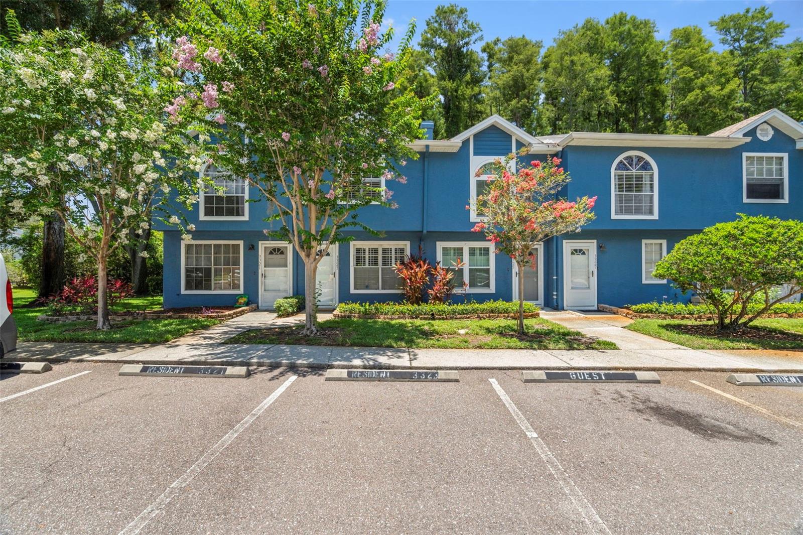 Honey, stop the car!!! This stunning townhome in the highly desirable Fox Chase community of Palm Harbor is truly one of a kind. Unlike
neighboring units, this property features a bonus room off the kitchen that can be used as an office, play space, or even additional storage! The home underwent a full makeover in 2020, showcasing brand-new flooring on the main level, plush carpeting upstairs, fresh paint throughout, and a beautifully updated kitchen with sleek countertops, modern cabinetry, and all-new appliances—including a refrigerator, microwave, dishwasher, washer, and dryer. New light fixtures throughout the home add a warm, contemporary touch, while a brand-new roof installed in 2025 provides years of low-maintenance living. The home also has a HVAC that was replaced in 2020. Inside, you'll appreciate the smart layout with a convenient first-floor powder bath, two upstairs bedrooms each with ensuite bathrooms, and vaulted ceilings that enhance the sense of space. The kitchen opens to a cozy dining area complete with a wet bar, perfect for entertaining, and sliding doors lead out to a lanai overlooking serene wooded views. The home is nestled within a well-maintained community that offers fantastic amenities, including a pool, playground, and tennis courts—and a brand-new gate has just been installed at the entrance, enhancing both security and curb appeal. Located just minutes from Gulf beaches, top-rated schools—including Sutherland Elementary, Palm Harbor Middle, and Palm Harbor University High—local shopping, restaurants, and easy access to Tampa and St. Pete, this home checks every box. Whether you’re a first-time buyer or looking for a beautiful place to call home, this move-in ready townhome is a rare find in a prime location. Don’t miss your opportunity to own one of the most updated and unique
units in Fox Chase!