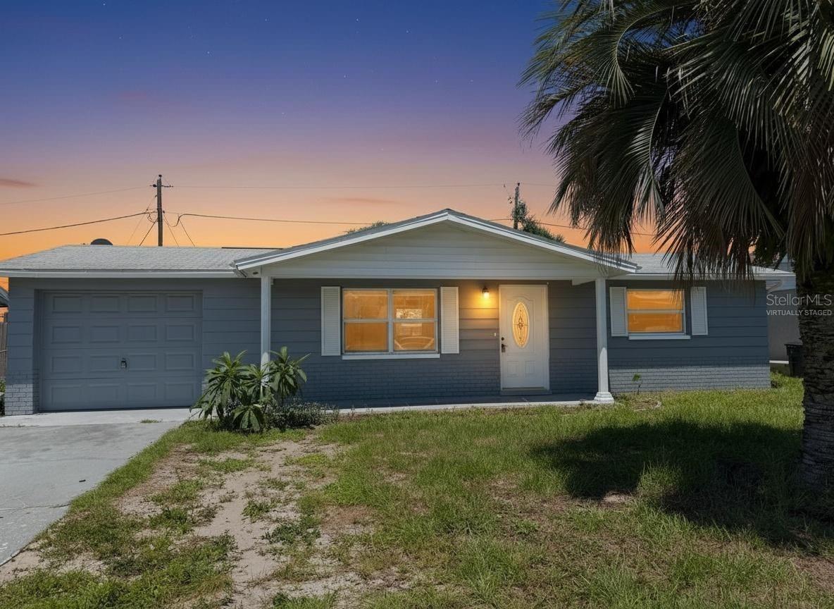 Virtually Staged. Welcome home to this beautifully updated 2-bedroom, 2-bath rental in the heart of New Port Richey! This charming home features an open-concept layout with spacious living and family rooms, offering plenty of space to relax, work from home, or entertain guests. The kitchen is equipped with stainless steel appliances and a dedicated dining area, while easy-care laminate flooring runs throughout the home.

Step outside to enjoy the covered lanai overlooking a fully fenced backyard, perfect for outdoor living, pets, or simply enjoying Florida's beautiful weather. The attached 1-car garage provides added convenience and storage. Includes washer and dryer!

Ideally located near shopping, restaurants, medical facilities, golf courses, parks, and Gulf Coast beaches, this home offers comfort, convenience, and a great location all in one. Available now. Schedule your private showing today!