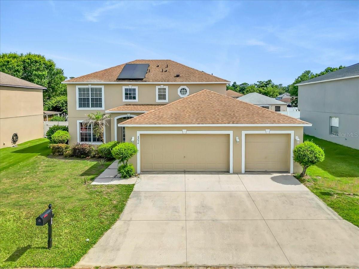 Virtually Staged. Welcome Home to one of Central Florida's Most sought after community, Lakeland, Florida! Positioned conveniently between Orlando & Tampa -Lakeland has wonderful communities of friendly residents, well maintained City and County Parks, Fishing/ Boating Lakes, Shopping Malls, Arts & Community Events, Business Opportunities for Growth, Great Hospital & Medical Groups within minutes commute.  FSC & SEU both reside here as well!  We are offering a wonderfully maintained and updated 4 Bed 2.5 Bath home PLUS a BONUS 5th Bedroom/ Bonus room/ Office downstairs. This home offers Plenty of Sq footage to have room to spread out and enjoy Friends & Family over for celebrations inside or out! 3 Car Garage storage and Parking in the OVERSIZED DRIVEWAY give ample space for a large group! Freshly Painted Interior & Exterior 2026, Updated Roof in 22', AC in 2025, Water Heater new in 2026, Renovated Kitchen in 2023, Solar Panels added less than 6 years ago SO the BUYER BENEFITS from the $36 average Electric bill Monthly for the life of the panels! Don't miss this Beautiful Home with So much potential to add a POOL IN THE Massive Privately Fenced Backyard! Enjoy BBQ TIME just in Time for Summer on the Generously 28x 10ft, Shady Screened, Covered Lanai! Call today Easy to show!