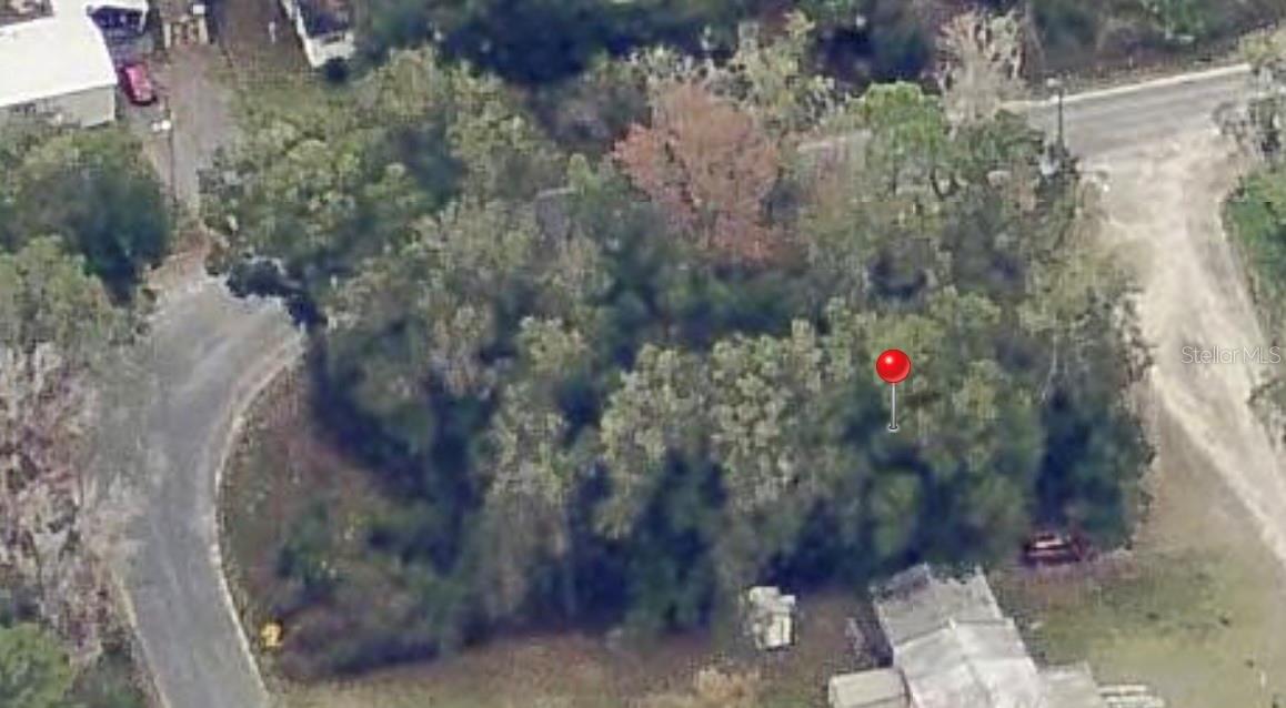 Discover the perfect opportunity to build, invest, or create your own private retreat on this beautiful just under ¼-acre vacant lot located in the heart of Citra, Florida, conveniently situated behind the well-known Pioneer Store. Nestled among mature trees and surrounded by the peaceful charm of Marion County, this property offers a quiet setting while still providing easy access to nearby amenities.

Whether you're looking for a homesite, a weekend getaway spot, or an investment property, this parcel offers endless potential. Even better, the adjacent lot is also available for purchase, giving buyers the unique opportunity to expand their footprint and enjoy even more space and privacy.