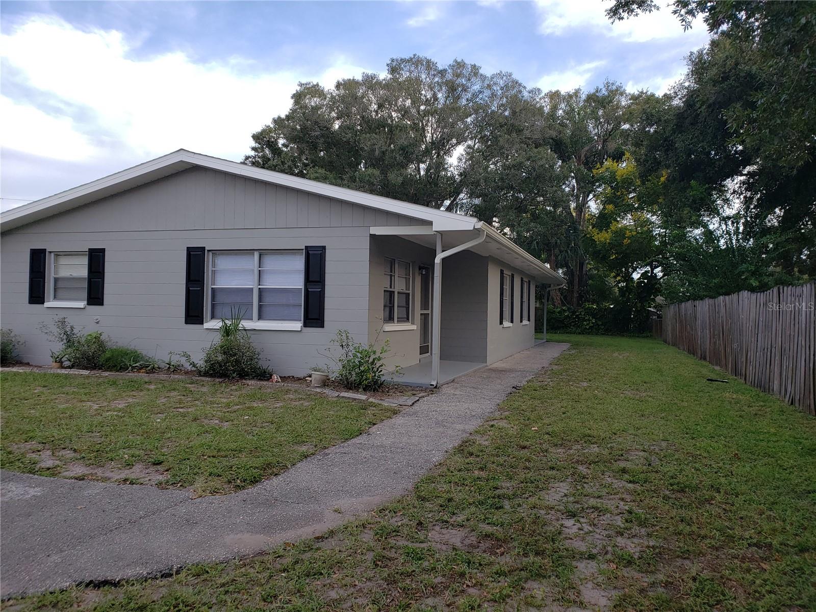 Spacious 2-bedroom 1 bath duplex with eat in kitchen. Carpet in all bedrooms and living room and LVP flooring in the kitchen. Kitchen features an exterior door that leads to an open patio for your grill. Large lot with large yard featuring storage shed. Property is located in Central Pinellas County close to public transportation and major roads in and out of the county. Open Parking