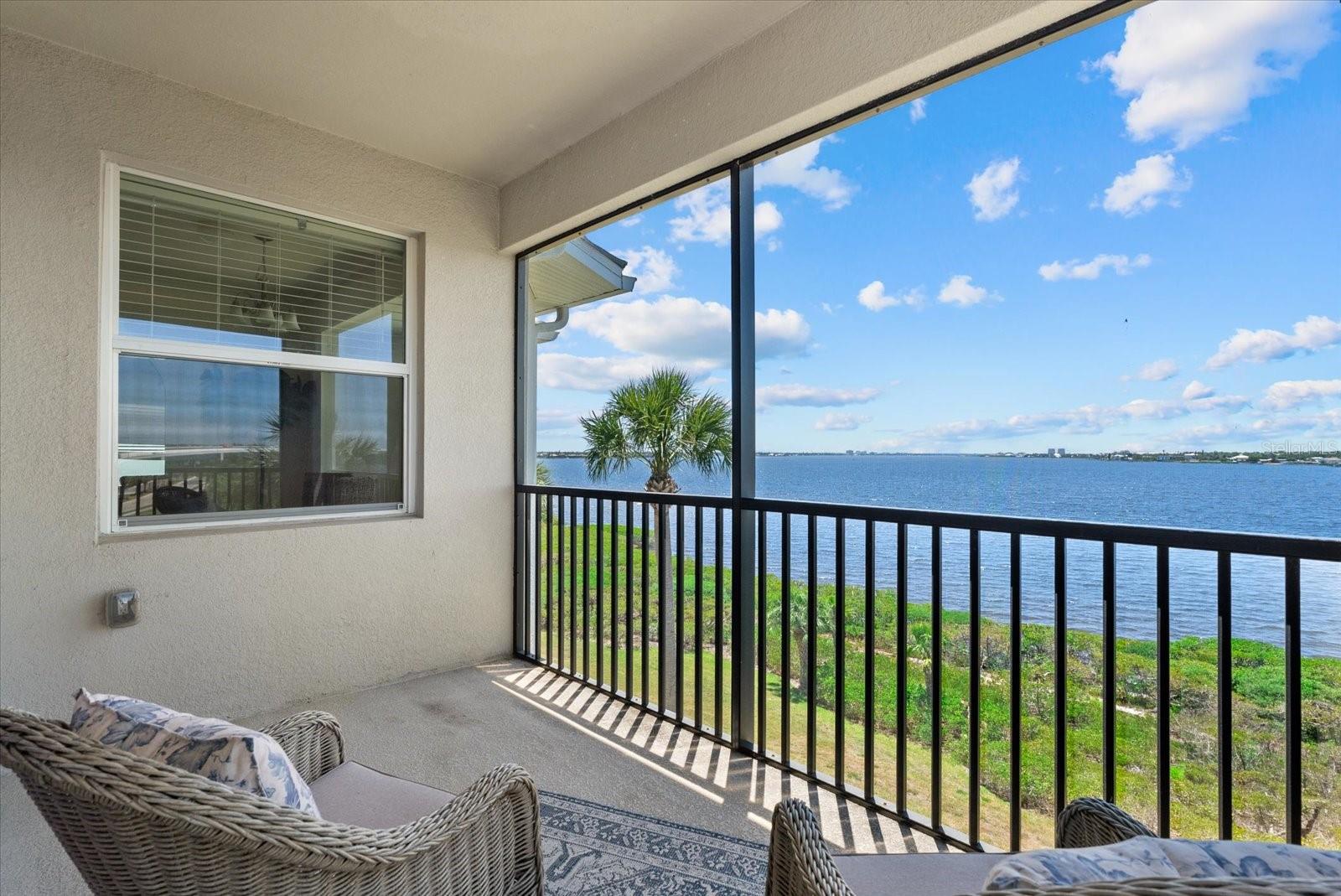 WATERFRONT LIVING IN A TRUE MARINA COMMUNITY — Bring your boat! - welcome to Tidewater Preserve, where every day begins with shimmering Manatee River views and ends with unforgettable golden sunsets. This private, gated boating community delivers the waterfront lifestyle buyers dream about, blending effortless luxury with the feeling of an everyday escape. Offered FURNISHED, this beautifully appointed Birkdale model condo is both stylish and inviting, with diagonal tile flooring, crown molding, quartz countertops, 42" cabinetry, designer lighting, a tasteful backsplash, and a massive island perfect for entertaining. The open layout flows seamlessly to the river-view lanai, where you can relax and enjoy dolphins, manatees, eagles, and the ever-changing beauty of the water. This home is also as smart as it is stunning, featuring Smart Home technology including an integrated door lock system, Ring doorbell, and thermostat for comfort, convenience, and peace of mind. Practical luxuries include an assigned carport and a large private storage closet, ideal for bikes, paddleboards, seasonal items, and all your beach and boating gear. Tidewater Preserve is what truly sets this property apart. This sought-after marina community offers private boat slip opportunities with direct access to the Manatee River, making it perfect for sunset cruises, fishing, and weekends on the water. Residents enjoy an exceptional array of resort-style amenities, including two clubhouses, three pools, two fitness centers, Har-Tru tennis courts, and a canoe/kayak launch and park with storage, plus a scenic riverfront nature trail that lets you slow down and savor the setting. Built in 2019, this condo offers the confidence today’s buyers want, with LOW MONTHLY CONDO FEES of just $775 and no CDD fees. Even better, the fee includes cable, water, escrow reserves, insurance, and maintenance, creating outstanding value for waterfront Florida living. With 24-hour gated security, beautifully maintained grounds, fully funded reserves, and an on-site Lifestyle Director, Tidewater Preserve offers a truly elevated and carefree lifestyle. This is more than just a condo — it’s a waterfront statement, an address that says you’ve arrived, and a lifestyle that makes you want to stay. Rare bonus opportunity: the neighboring unit, #406, is also available, creating an exceptional chance to own side-by-side residences for multi-generational living, a private guest retreat, or a luxury second-home pairing.