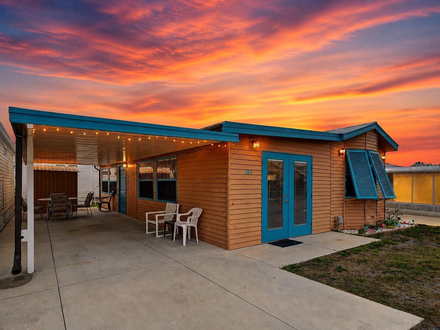BEST DEAL IN THE COMMUNITY! CAN BE SOLD COMPLETELY TURNKEY. Welcome to Holiday Travel Park where coastal comfort meets every-day convenience in Englewood! THIS IS THE LARGEST CURRENTLY AVAILABLE. Enjoy a very well maintained property with a charming theme and newly built carport and new metal roof. Featuring 2 bedrooms and a lot more space than any other unit in the community has to offer, this is the obvious choice! If you're looking for the perfect 55+ community, then there is no need to keep looking. For a super low fee of $140 a month, you get access to a maintenance free lifestyle and a gated community with tons of amenities such as a beautiful pool, community boat ramp, bocce ball, shuffleboard, horseshoes, laundry facilities, activity center, yard maintenance, indoor pickle-ball courts, pool tables, dog parks and tons of weekly social activities. Water, sewer and trash are also included in the $140 monthly fee. This is truly the best bang for your buck. Enjoy optional boat/RV storage if you'd like to store them on-site for a small fee. The community is located within 10 minutes of Englewood and Manasota Key Beach, golf courses, shopping, dining, marina's, medial office, hospital and more. Right up the road from Historic Dearborn Street, Farmers markets and multiple marinas. This property puts you close to everything while still offering a peaceful residential setting. Don't miss this property - Schedule your showing today!